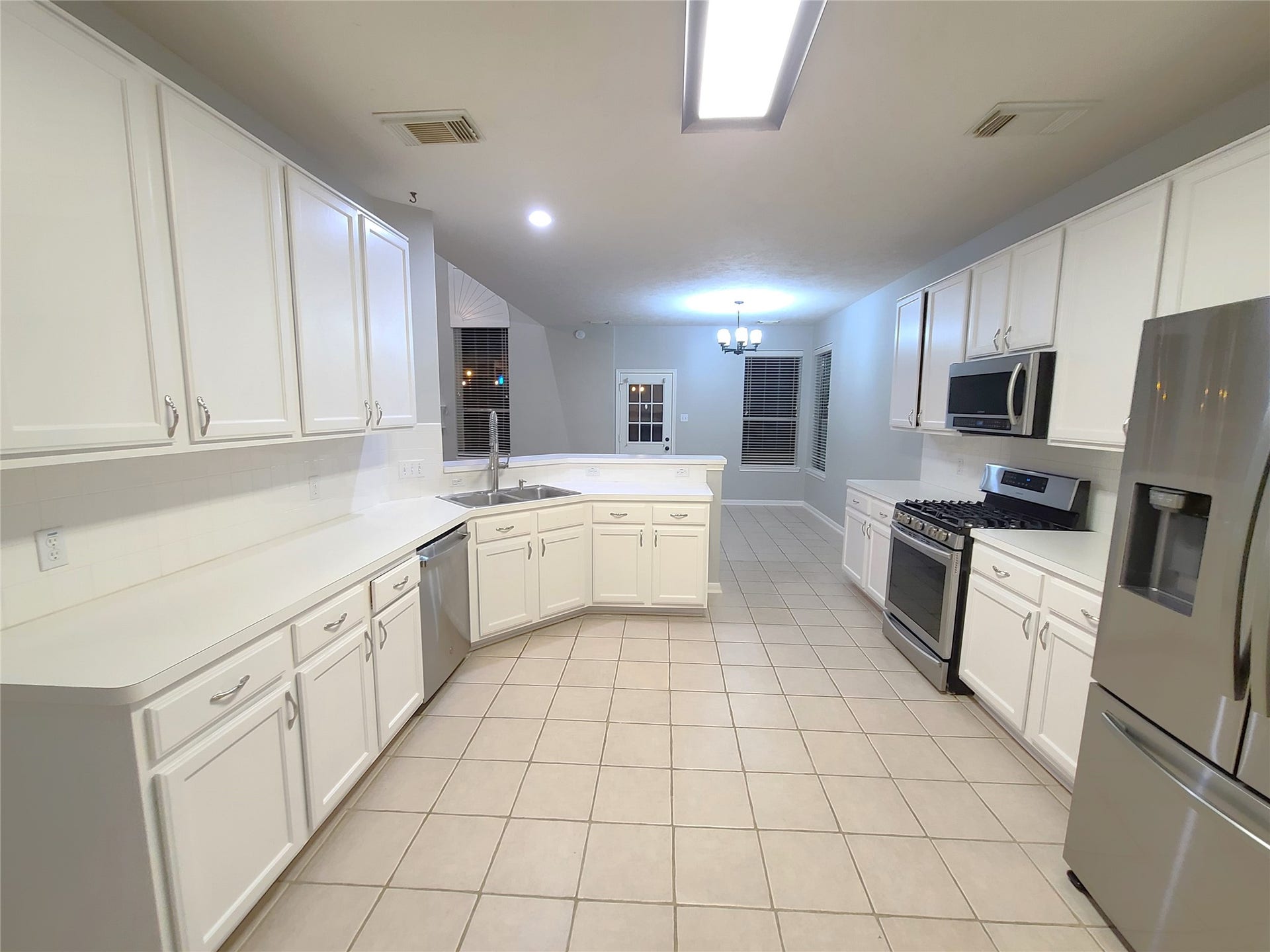 Spacious, recently-painted kitchen, includes new refrigerator