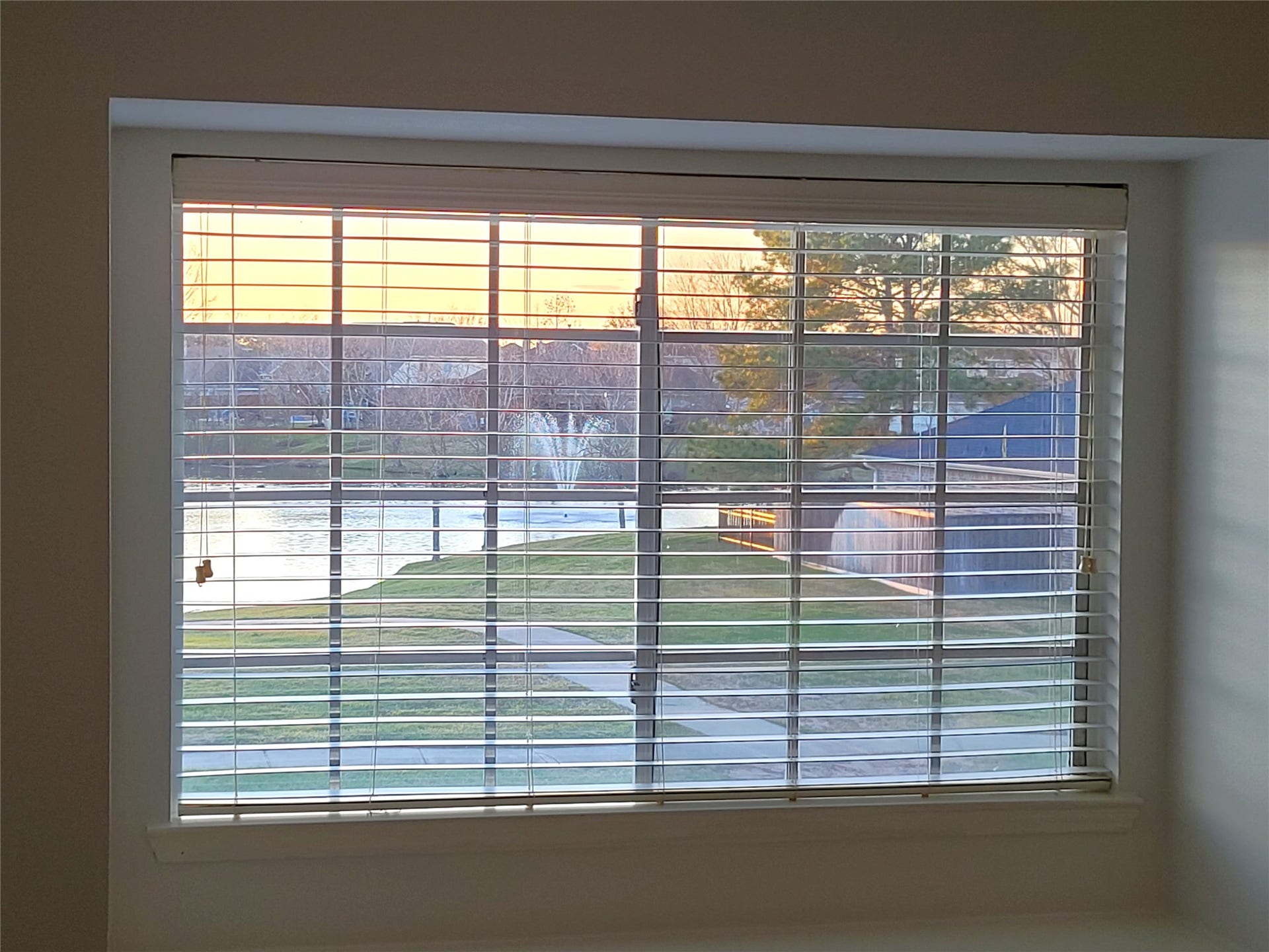 2 of the upstairs bedrooms have beautiful views of the lake and water fountain