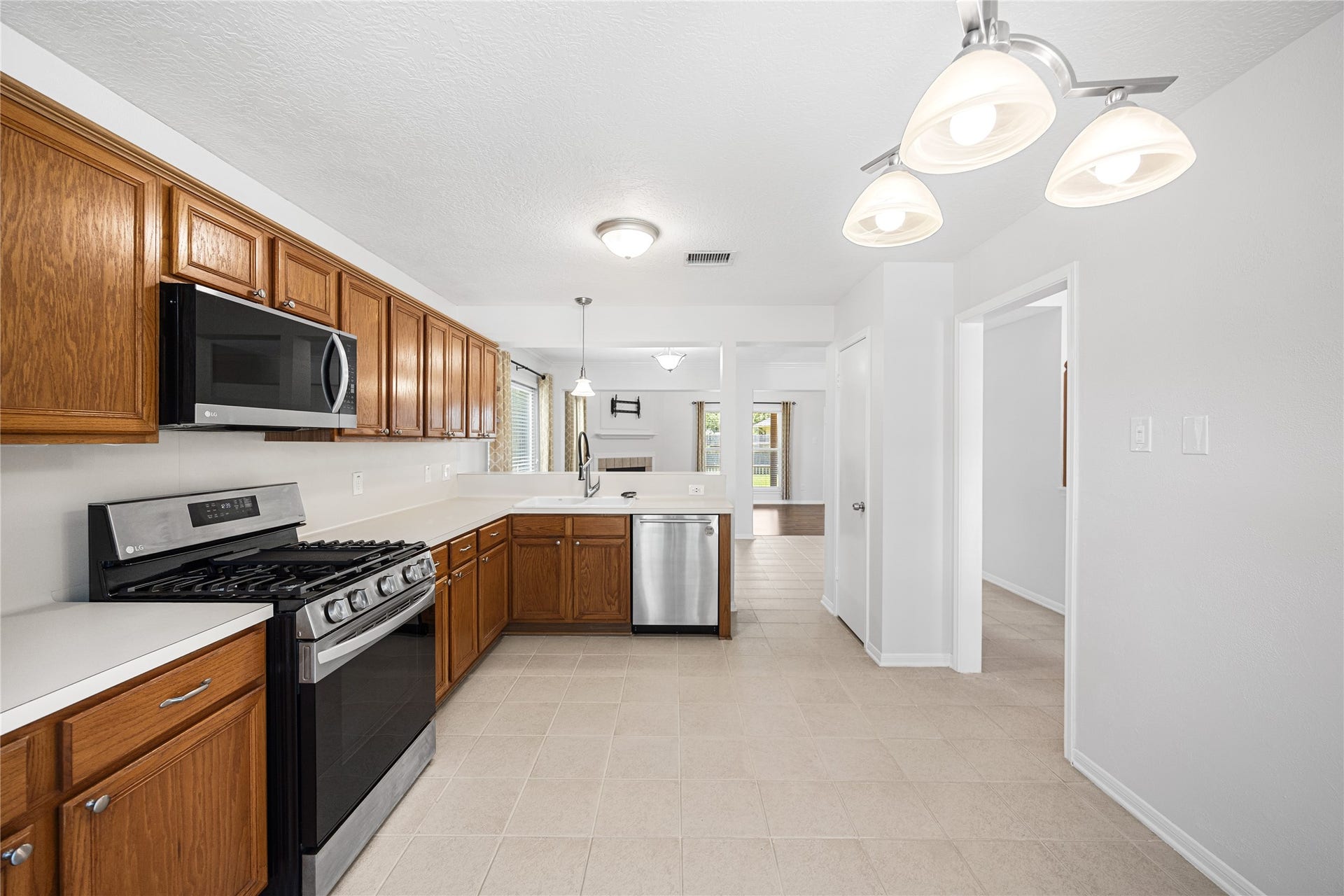 16003 Salton Point Drive, Friendswood, TX 77546 Kitchen with generous cabinetry and prep space.