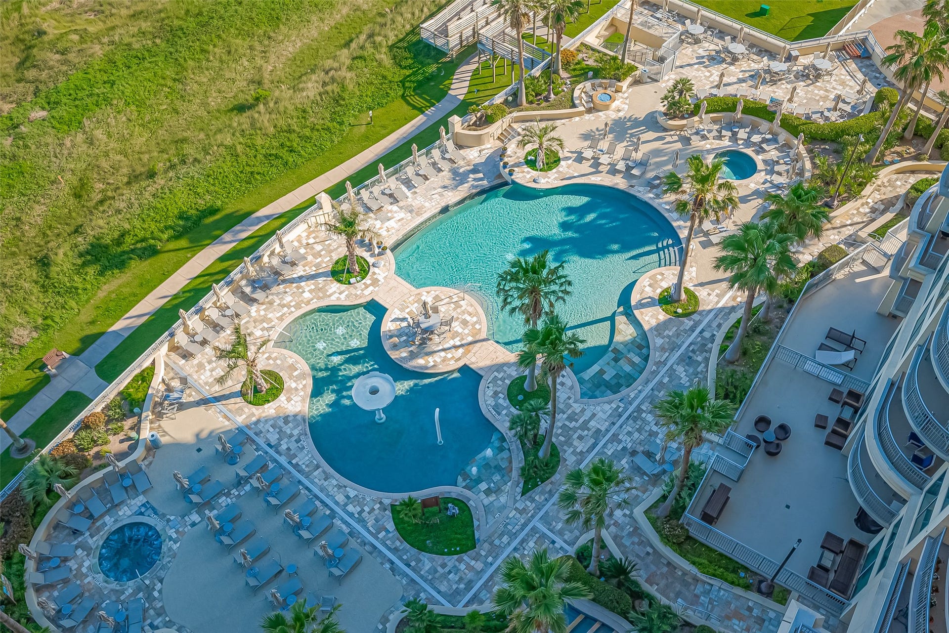 801 E Beach Drive, #BC506, Galveston, TX 77550 Extremely popular Southbeach floorplan with breathtaking beach and pool views from this move-in ready 3-bedroom, 3 bath condo at Palisade Palms. Enjoy the stunning scenery and shimmering lights!