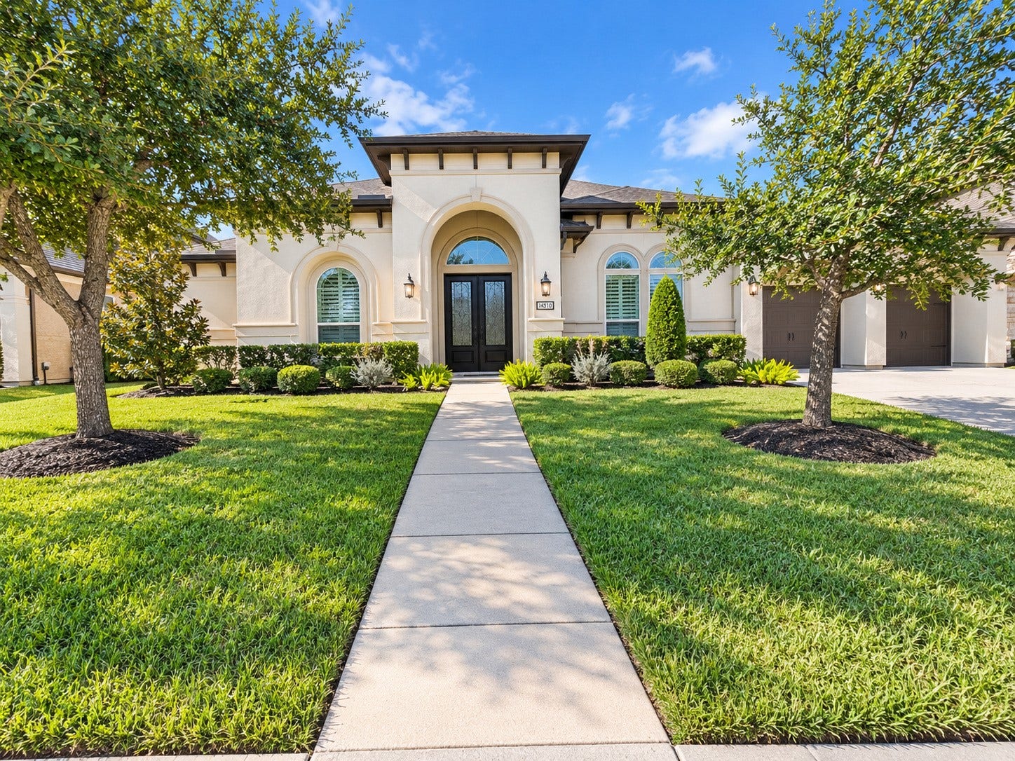 3414 Magnolia Shores Lane, Pearland, TX 77584 Welcome Home to 3414 Magnolia Shores! Impressive curb appeal featuring elegant stucco architecture, mature trees, and beautifully arranged landscaping.