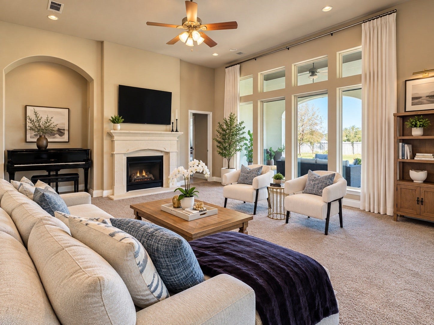 3414 Magnolia Shores Lane, Pearland, TX 77584 Spacious family room featuring generous seating space, large windows, and a warm, inviting atmosphere.