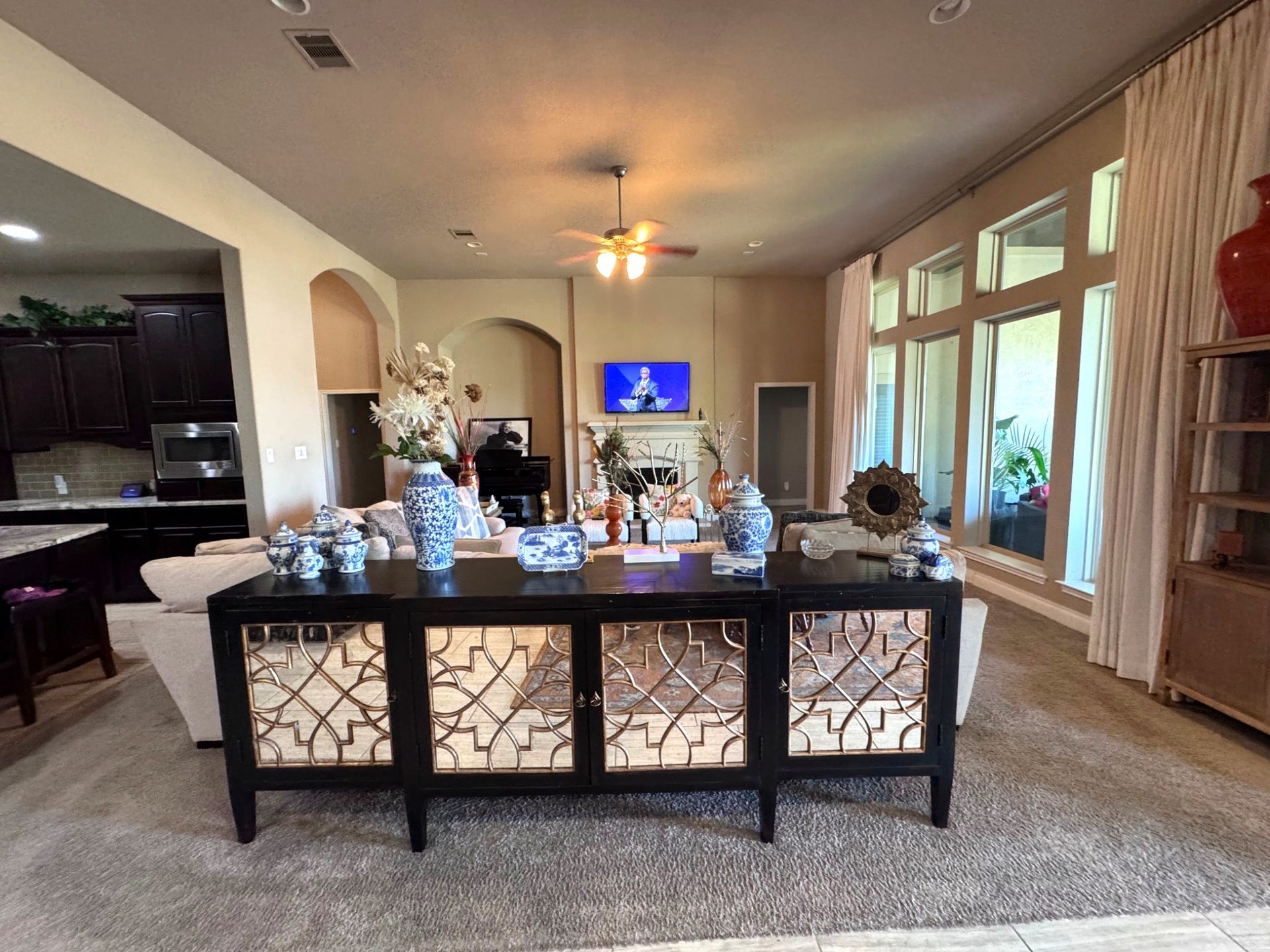 3414 Magnolia Shores Lane, Pearland, TX 77584 Open-concept living and dining spaces provide a wonderful setting for entertaining and everyday living.