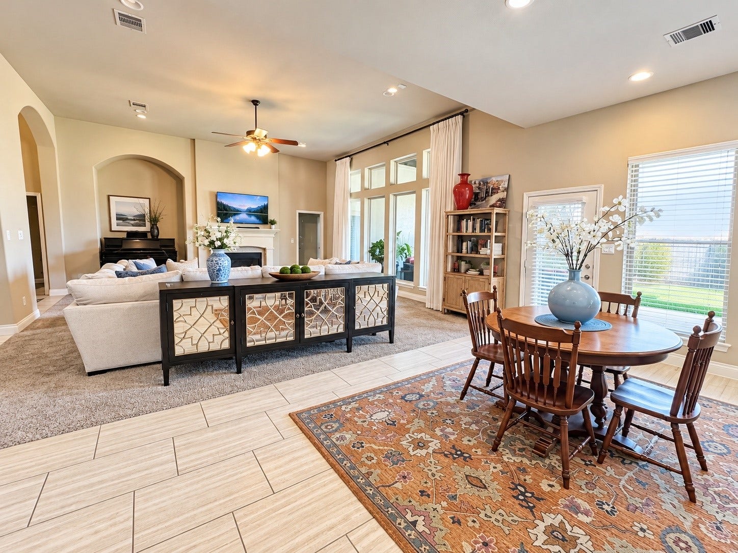 3414 Magnolia Shores Lane, Pearland, TX 77584 Generous family room featuring beautiful windows, a fireplace, and ample space to relax or entertain.