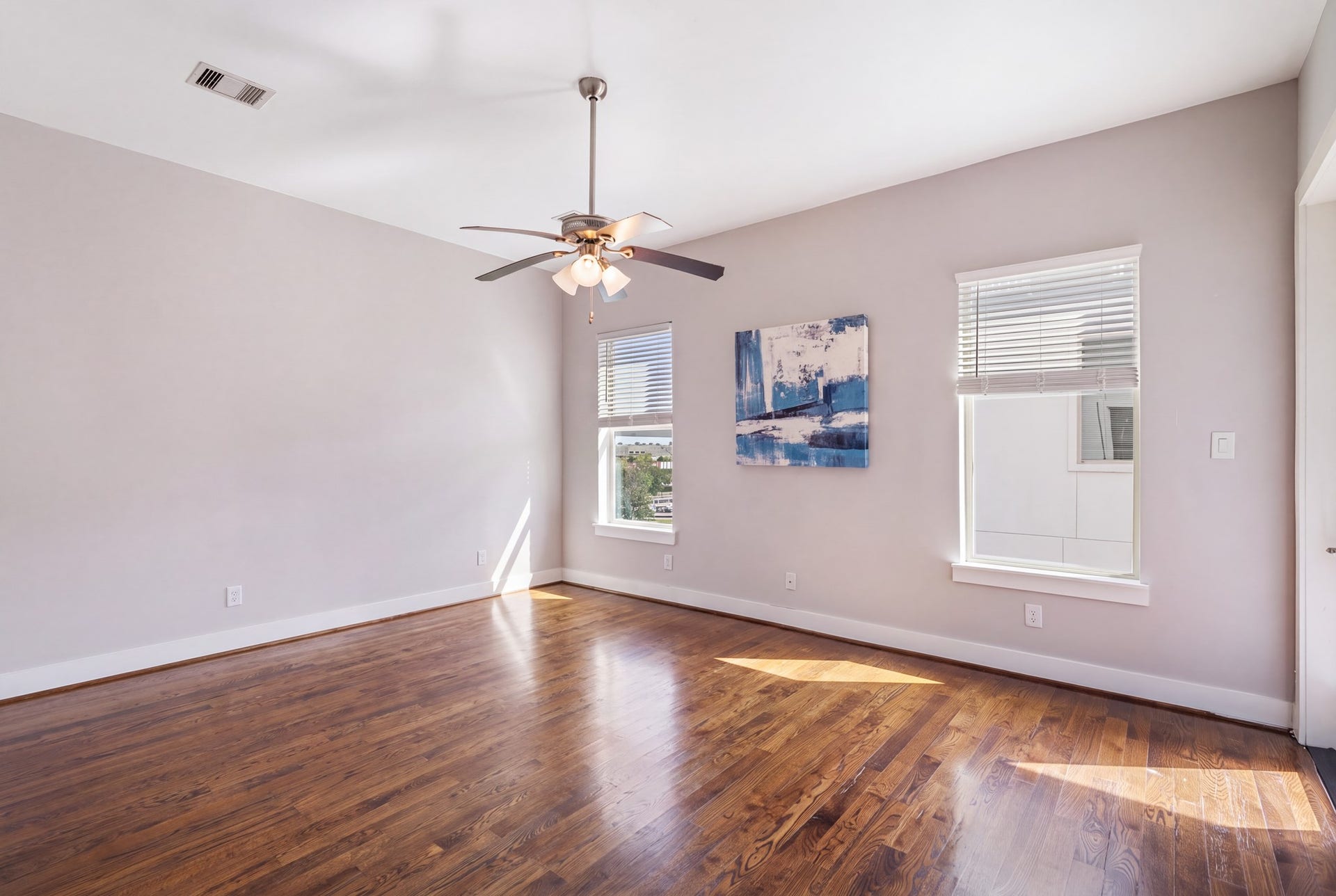 1005 Bingham Street, #5, Houston, TX 77007 Third floor primary bedroom with large windows for natural light.