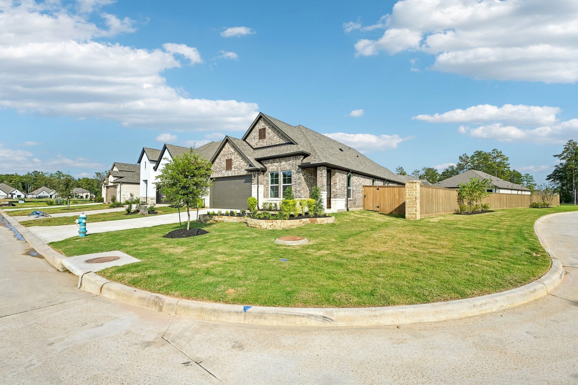 7241 Ironwood Tee Court, Porter, TX 77365 Corner homesite provides additional yard space and an open feel within Fairway Pines.