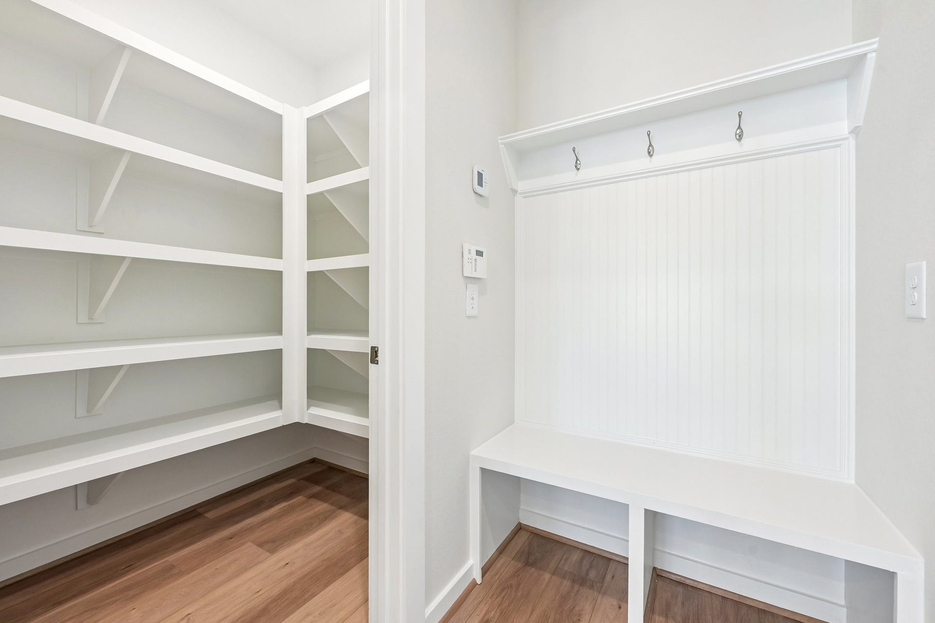 7241 Ironwood Tee Court, Porter, TX 77365 Built-in drop zone with bench and hooks, plus generous shelving to keep everyday essentials organized and out of sight.