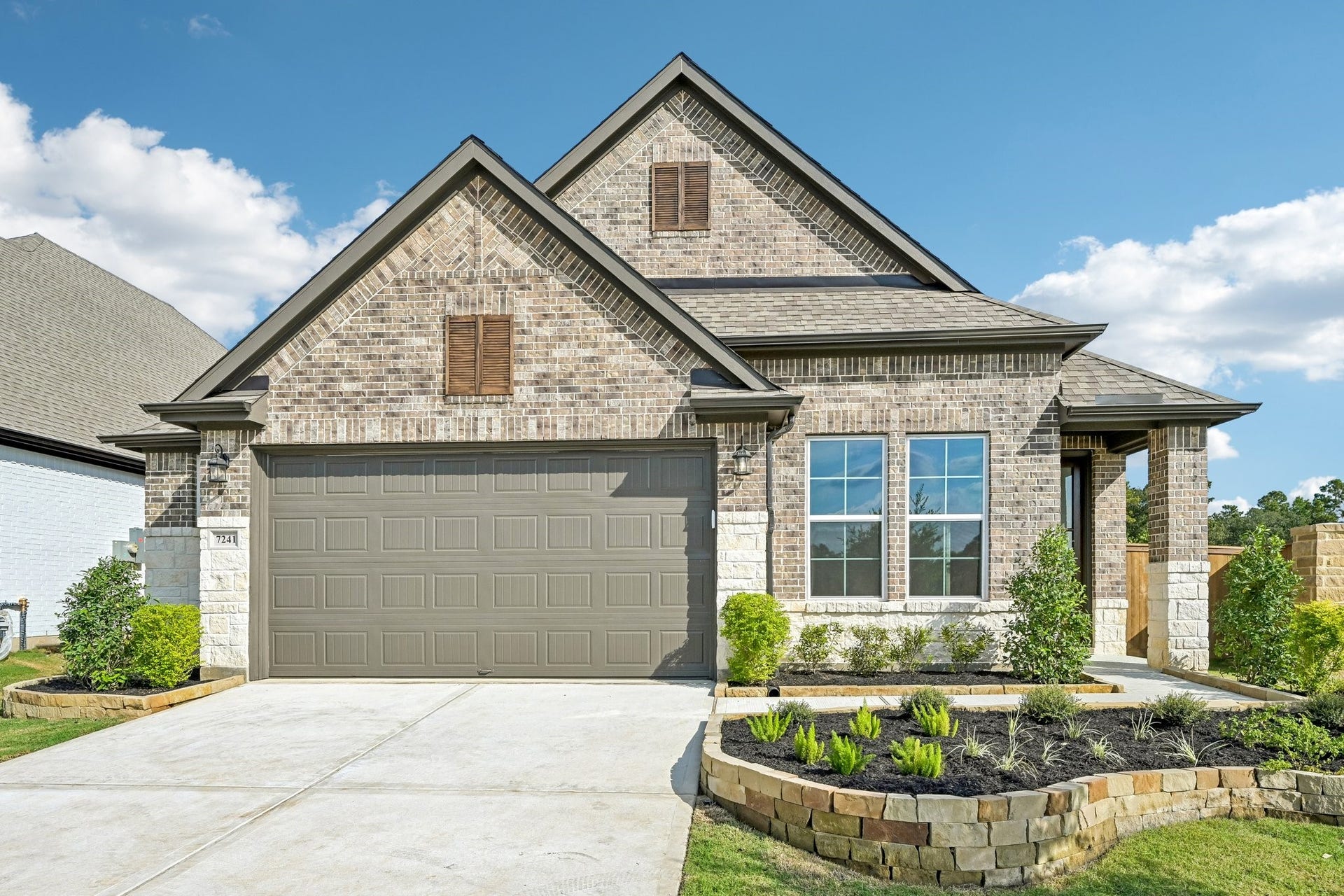 7241 Ironwood Tee Court, Porter, TX 77365 Beautiful brick exterior on a spacious corner homesite in Fairway Pines at The Highlands.