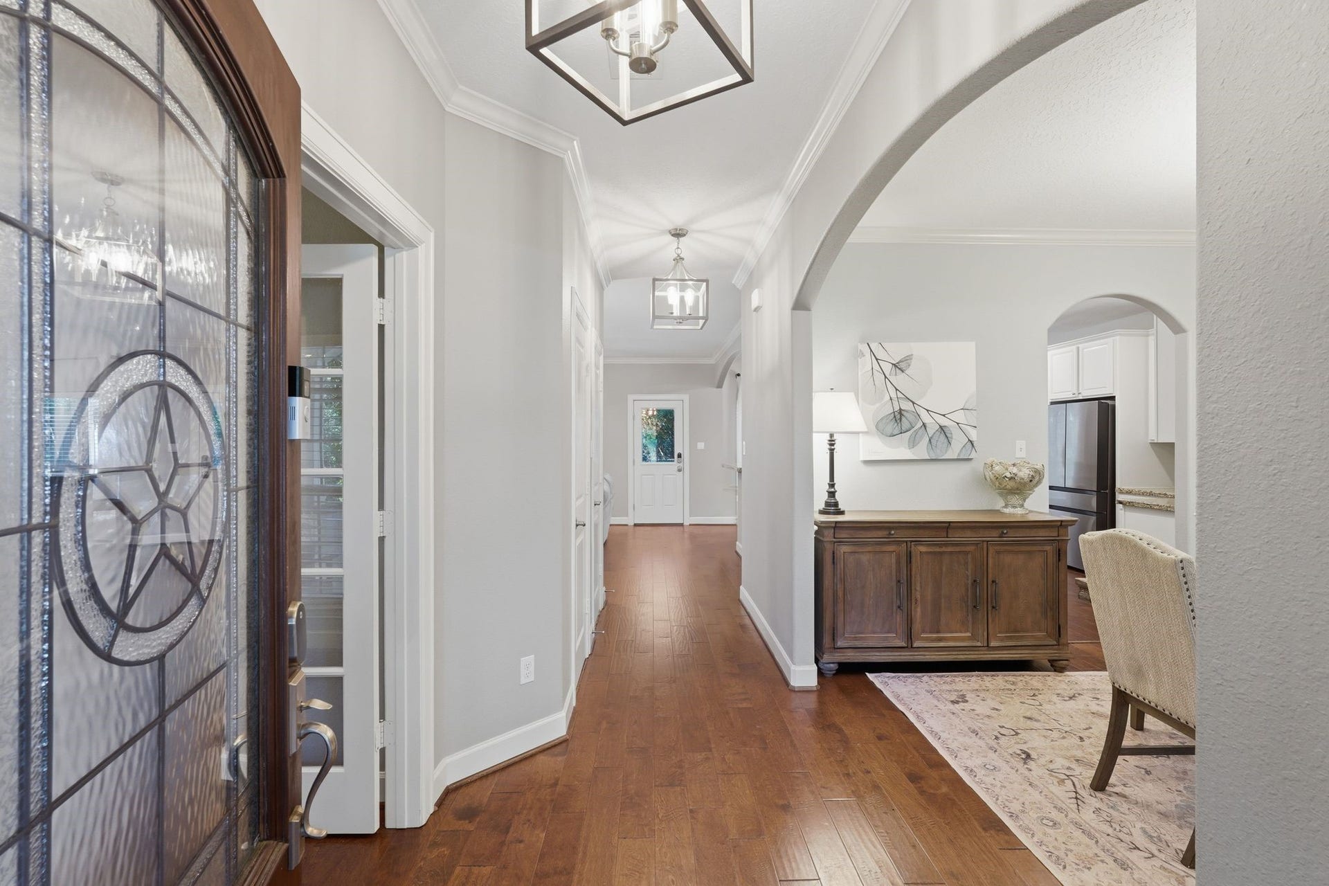 Recently painted neutral palette, upgraded lighting throughout the home.  Hardwood floors, crown molding, and impressive room sizes.