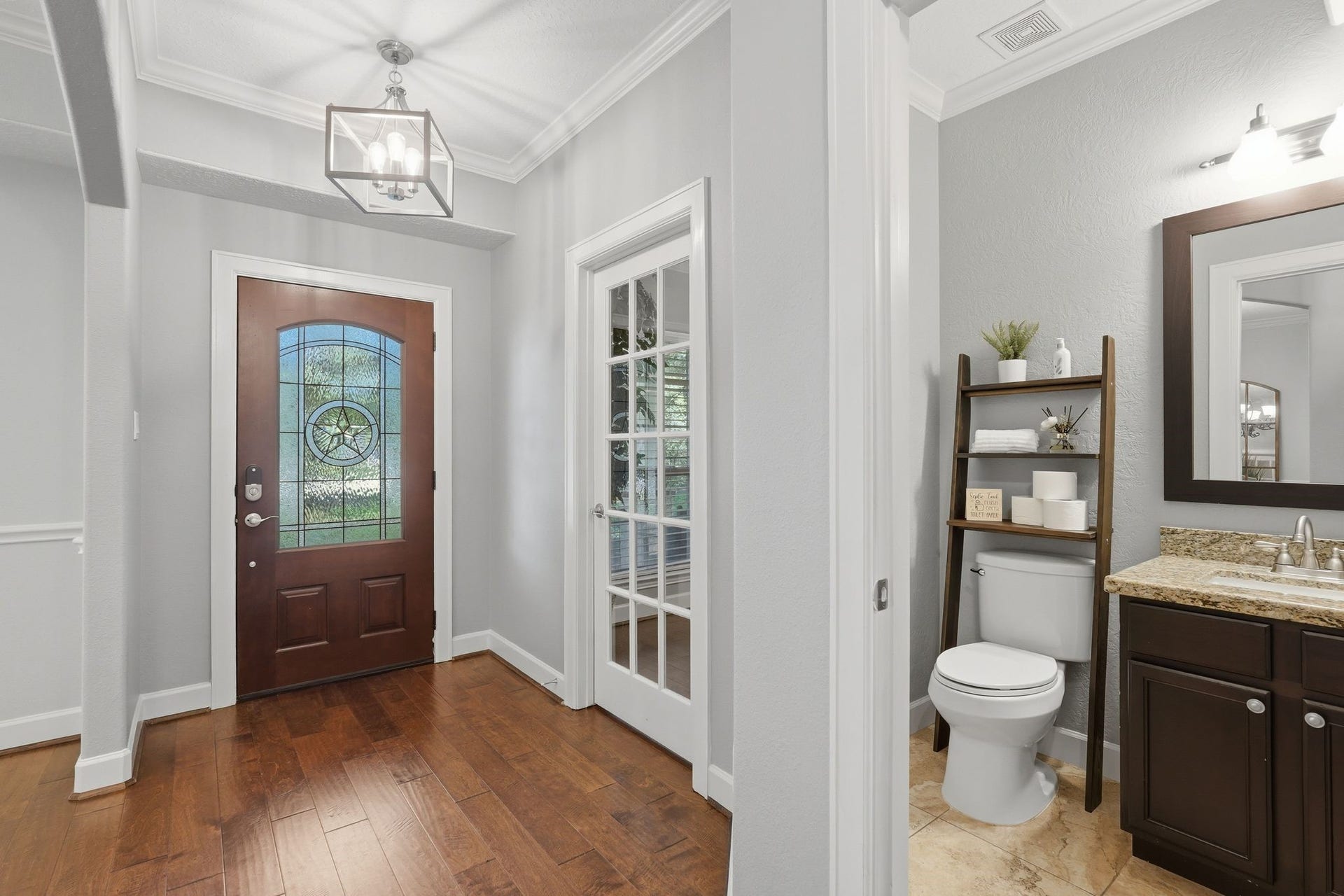 First floor powder bath near private study.