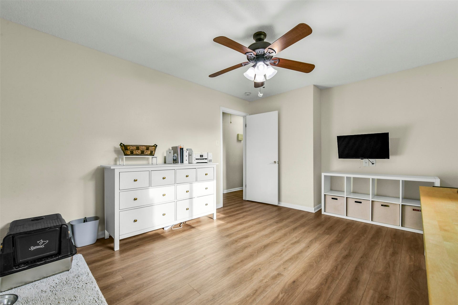 19611 Suncove Lane, Humble, TX 77346 Let your needs shape the space. This additional view of the room currently used as an office highlights its generous floor space and versatile layout, with room to combine workstations, storage and a comfortable sitting area.