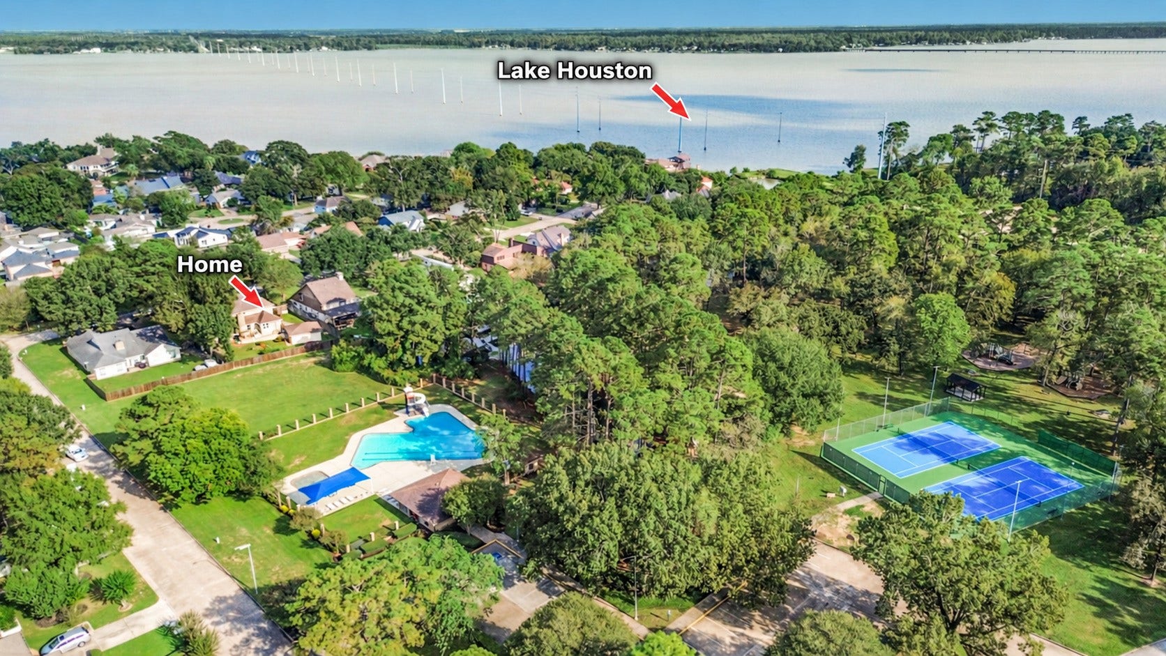 19611 Suncove Lane, Humble, TX 77346 See how close home is to the places youll love spending time. One arrow identifies the property, while the other highlights nearby Lake Houston. With the pool and tennis courts also visible, this aerial view puts the homes inviting surroundings into perspective.