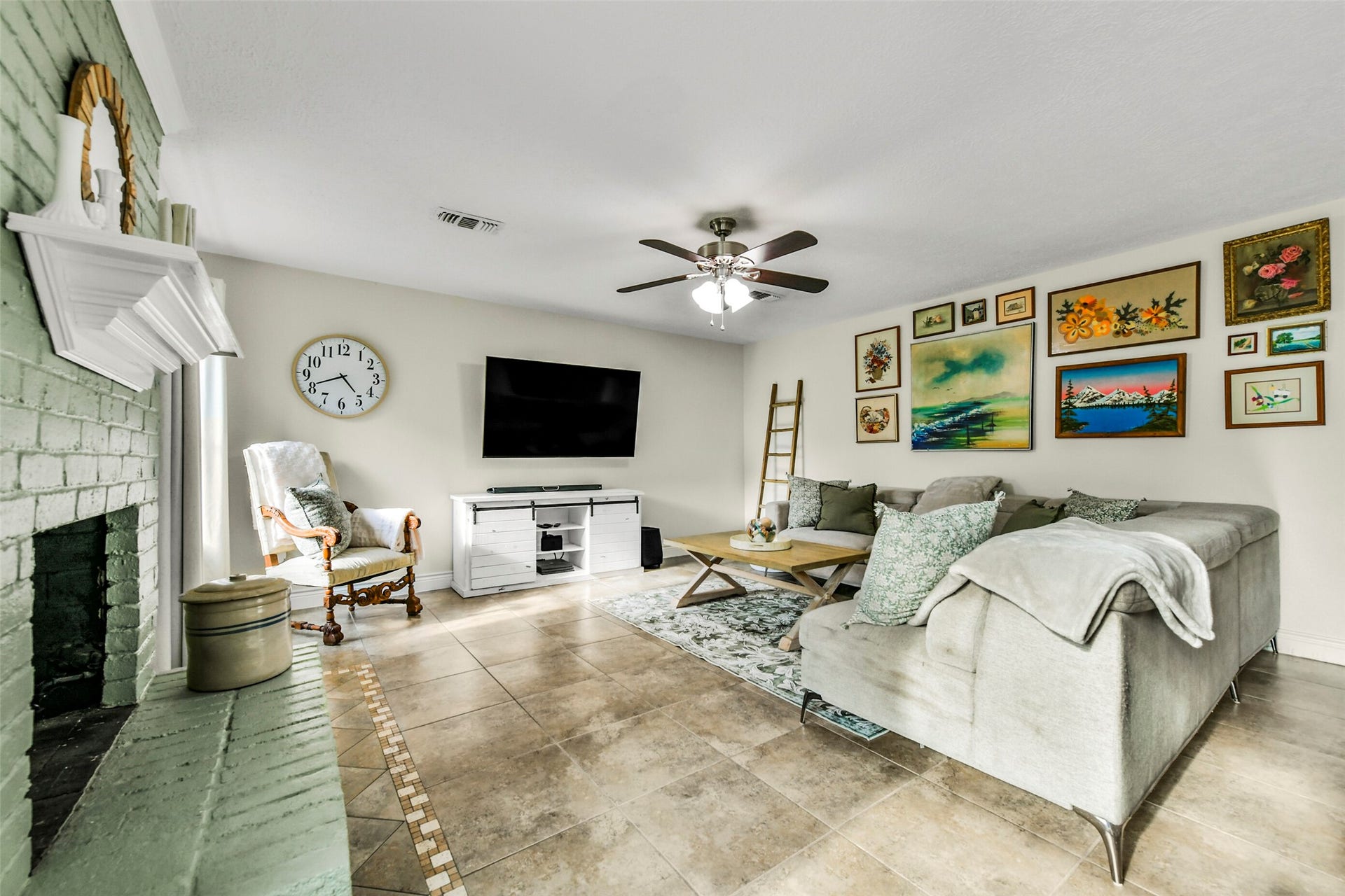 19611 Suncove Lane, Humble, TX 77346 Gather around a fireplace that brings character and warmth to the living room. Generous seating space and natural light create an inviting setting for quiet evenings, lively conversation and everyday unwinding.