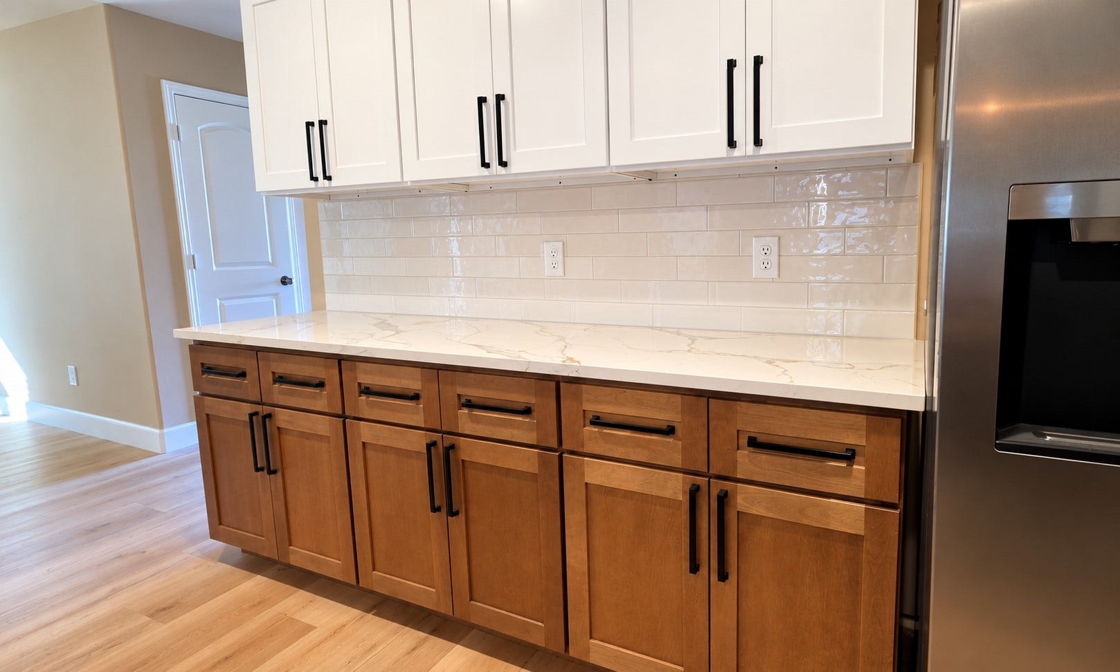 1402 Rodeo Cattle Lane, Houston, TX 77049 Lots counter space features and gorgeous subway tile back splash through out the kitchen