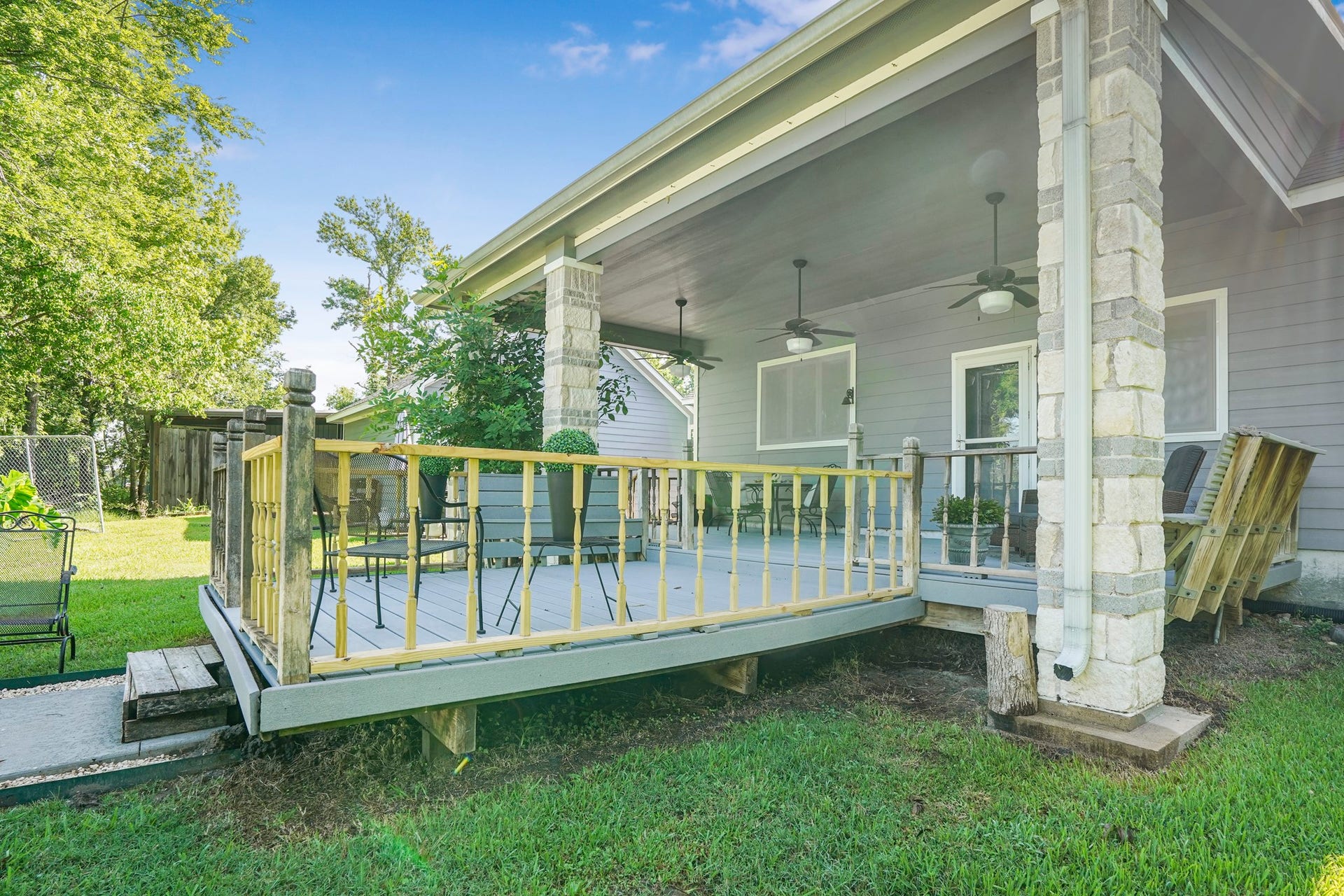 20547 Crosby Eastgate Road, Crosby, TX 77532 Deck off of the main house overlooks the pool
