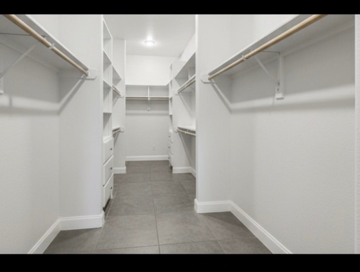 20547 Crosby Eastgate Road, Crosby, TX 77532 Huge primary closet! It is L shaped and measures to be 29 feet long!