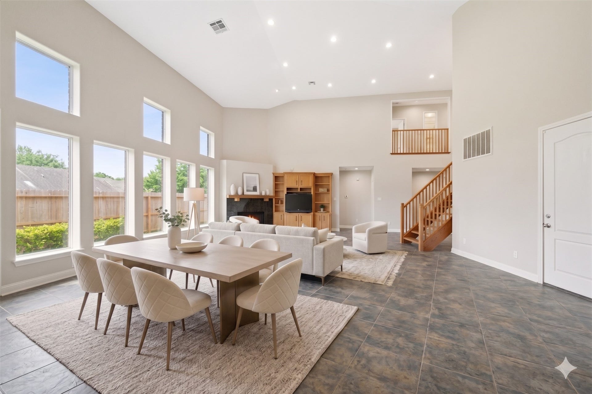 412 Live Oak Lane, Friendswood, TX 77546 Looking from the kitchen, this bright space features direct access to the back fenced patio and green space. *Virtually staged