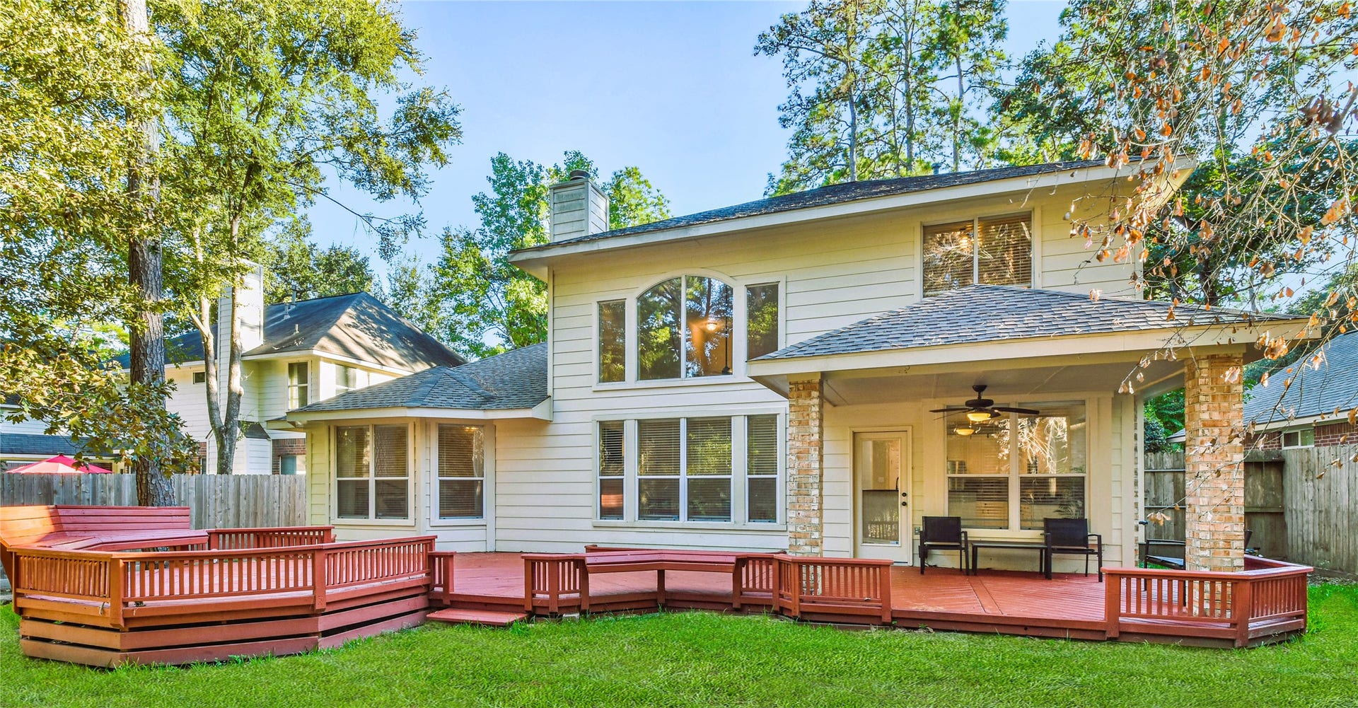 109 N Acacia Park Circle, The Woodlands, TX 77382 Looking for a place to enjoy the outdoors, check out the back deck! It spans the entirety of the back of the house!