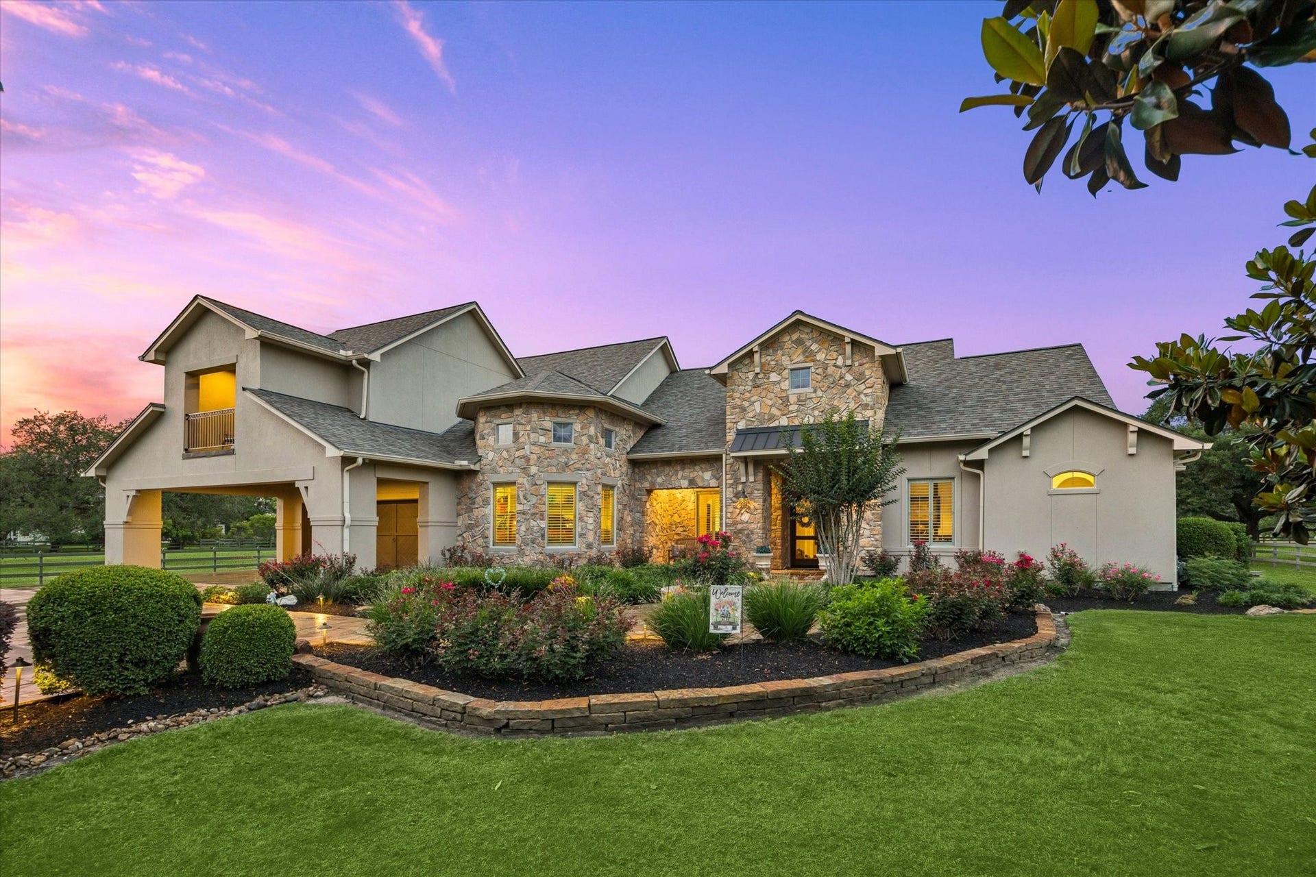 32102 Fulbrook Commons, Fulshear, TX 77441 Custom Steve Epps showcase home. Landscaping and timeless stonework enhance the home's impressive curb appeal from every angle.