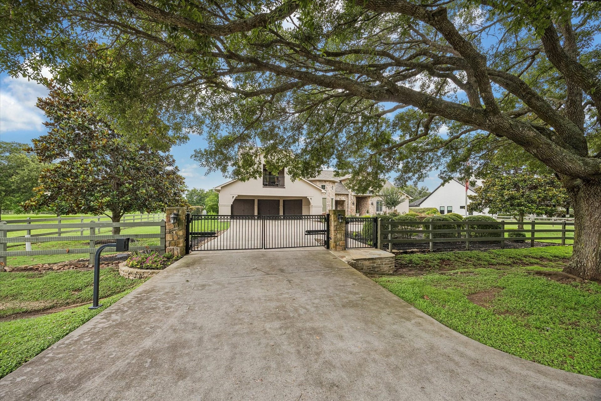 32102 Fulbrook Commons, Fulshear, TX 77441 A gated entry welcomes you home, providing an added layer of privacy and peace of mind. Recently added pedestrian gate with flagstone walkway add accessibility.