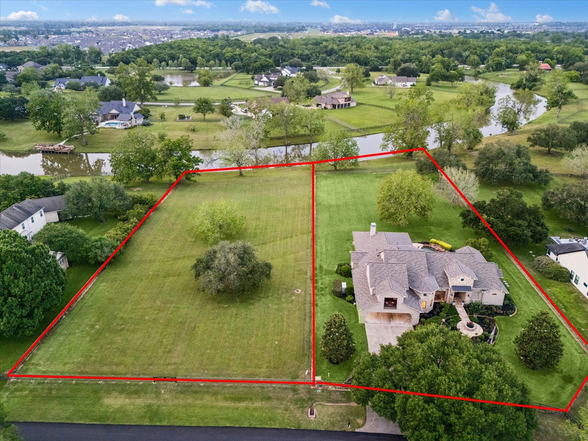32102 Fulbrook Commons, Fulshear, TX 77441 The adjoining 1.3-acre waterfront lot and this 1.5-story home are both available
for sale and may be purchased together.