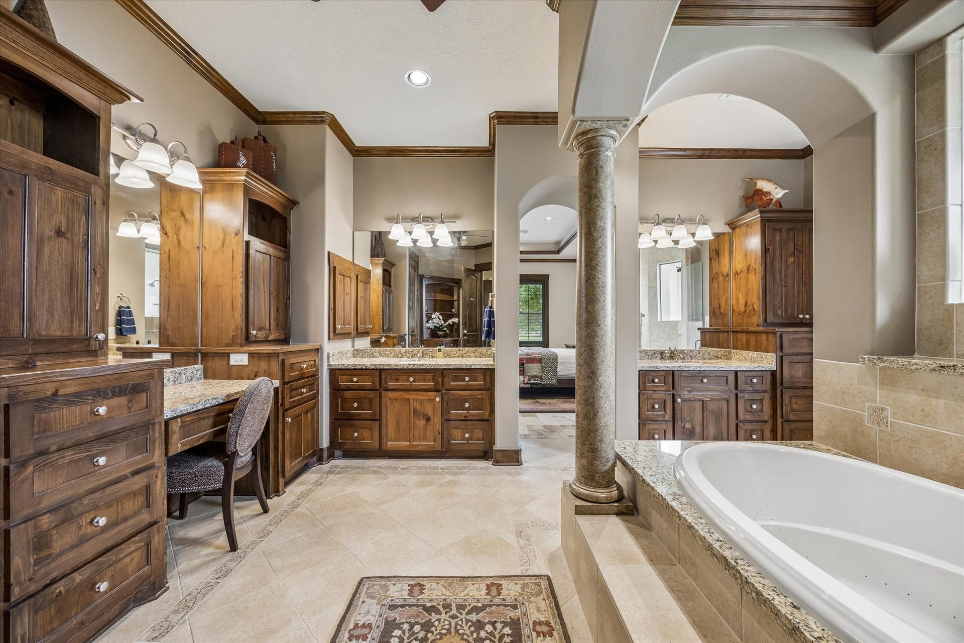 32102 Fulbrook Commons, Fulshear, TX 77441 Designed with comfort in mind, the luxurious bath features dual vanities, extensive storage, and refined finishes throughout.
