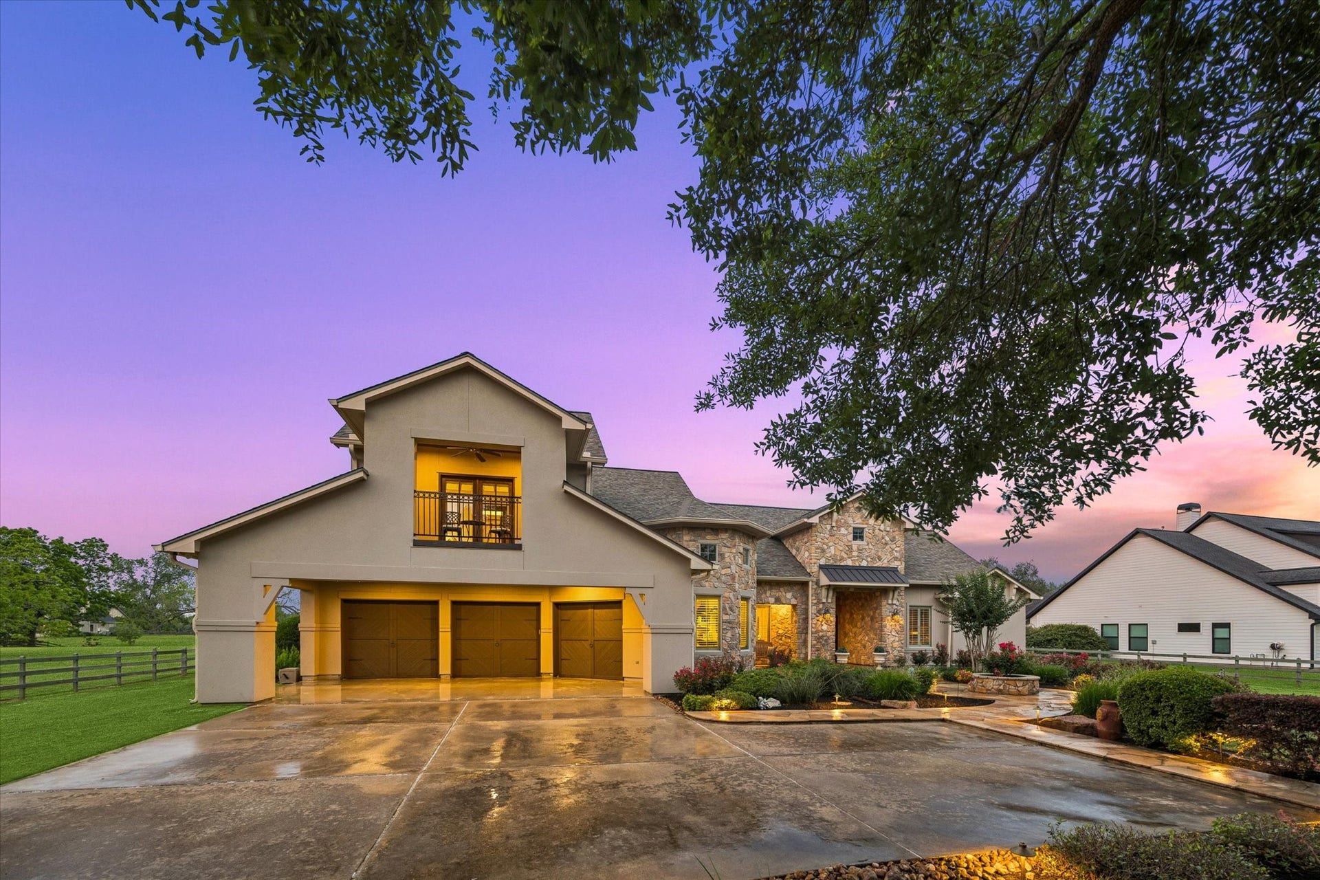 32102 Fulbrook Commons, Fulshear, TX 77441 The thoughtfully designed architecture of this property creates a striking first impression as you arrive home. 3 car garage, covered 3 car portico, extra driveway parking, a front facing covered balcony, landscape lighting, and an auto gate are all features to add to teh sophistication of this estate property.