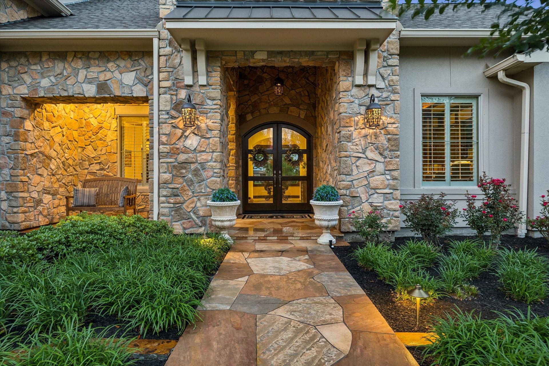 32102 Fulbrook Commons, Fulshear, TX 77441 The front entrance showcases rich architectural details and an inviting sense of arrival.