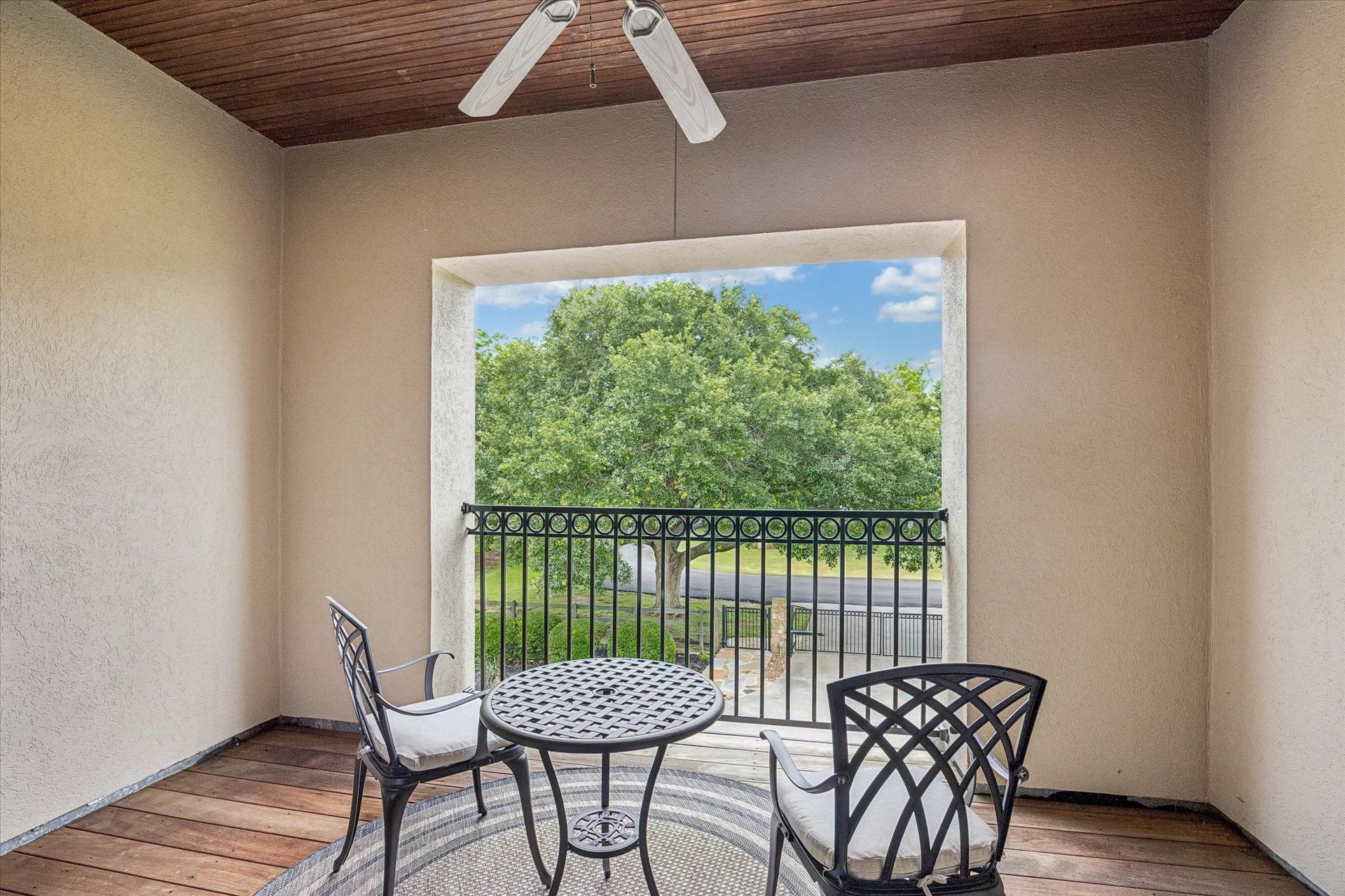 32102 Fulbrook Commons, Fulshear, TX 77441 Enjoy a quiet morning coffee or unwind in the evening from this upstairs covered balcony overlooking the beautifully maintained grounds and the bird sanctuary across the street. Recently updated decking. Also includes wood paneled ceiling.