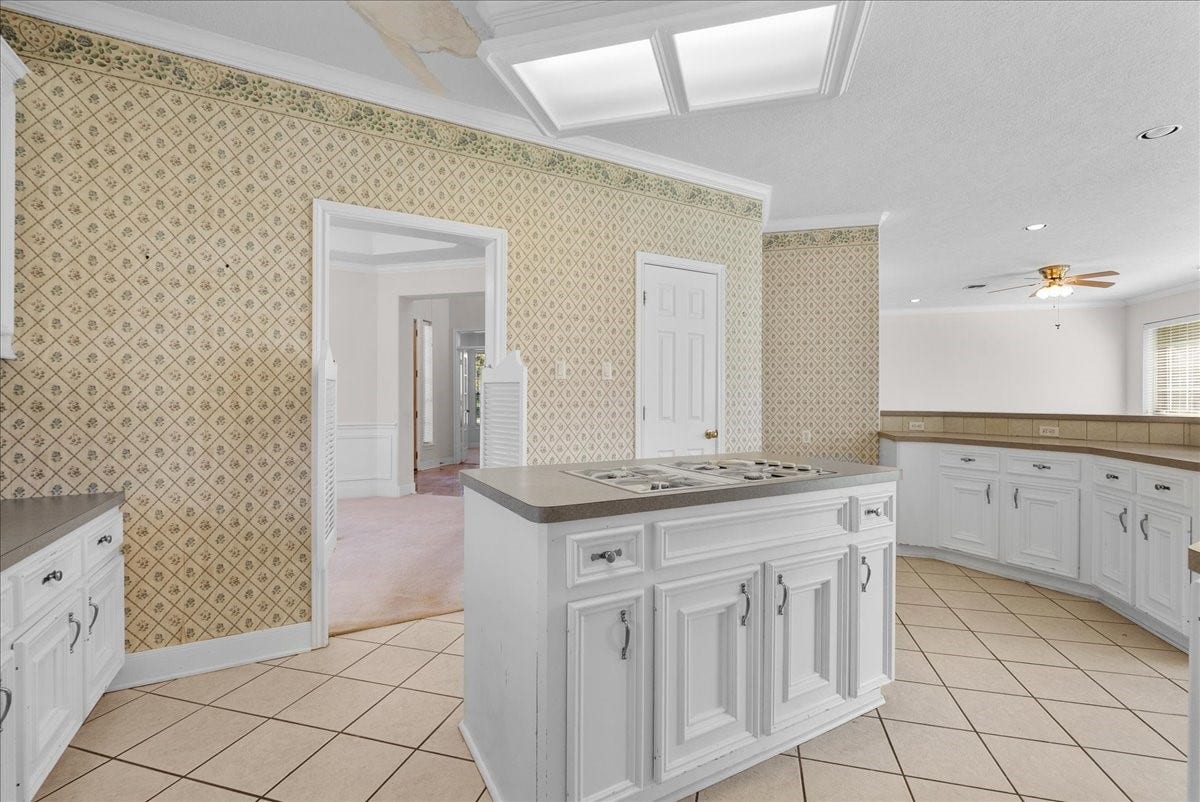 4402 Santee Drive, Baytown, TX 77521 Measuring an expansive 18x14 feet, this generous kitchen is illuminated by daylight.