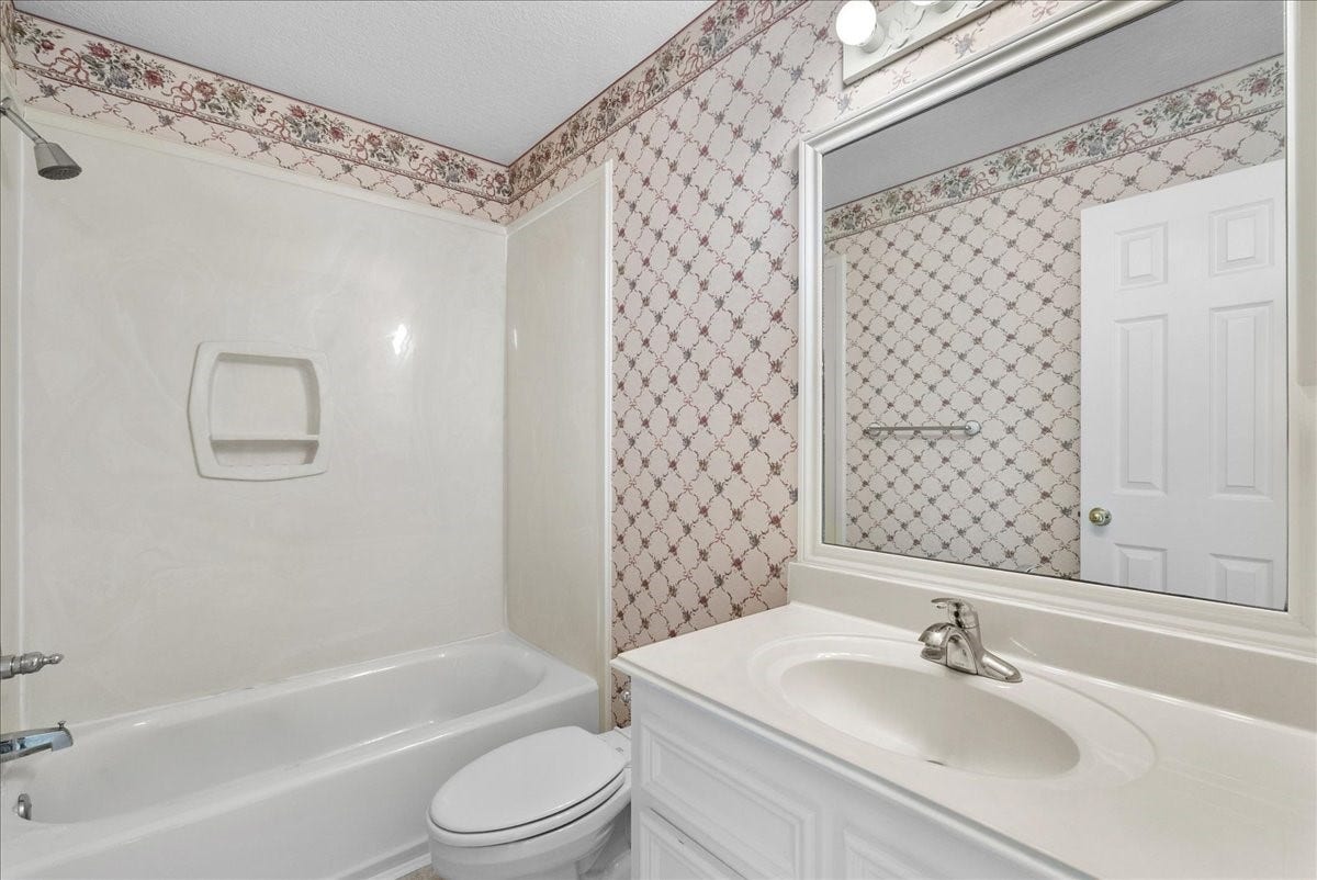 4402 Santee Drive, Baytown, TX 77521 Ample vanity counter space flanking the sink gives guests plenty of room for toiletries