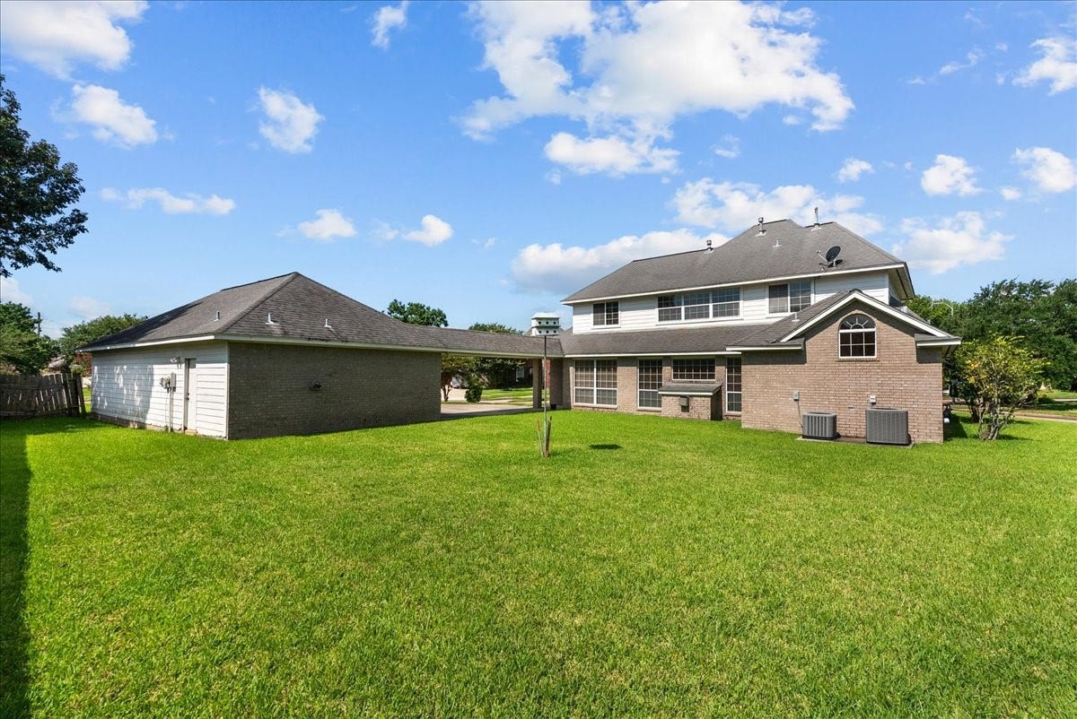 4402 Santee Drive, Baytown, TX 77521 The level, wide-open lawn delivers immediate functional flexibility for active households.