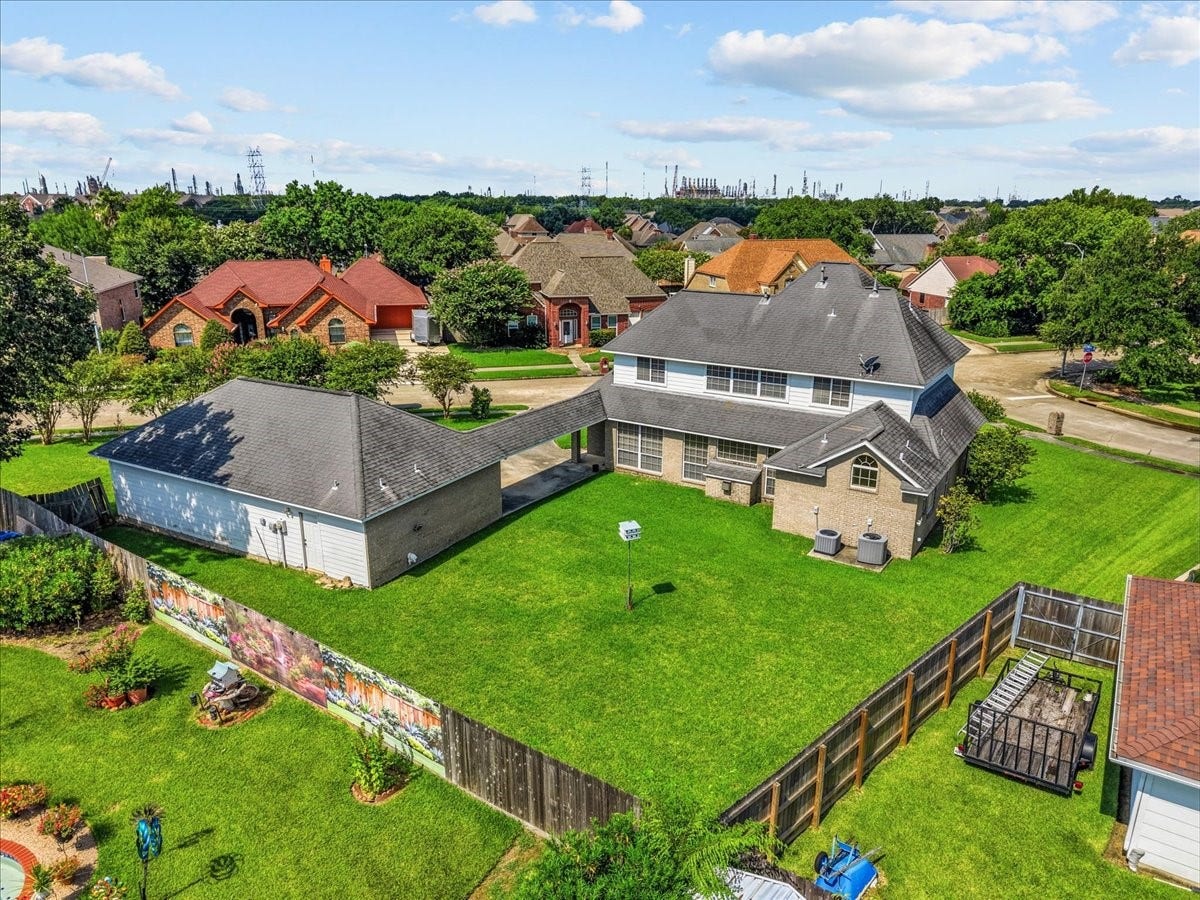 4402 Santee Drive, Baytown, TX 77521 The Yard is already partially fenced creating privacy from neighbors.
