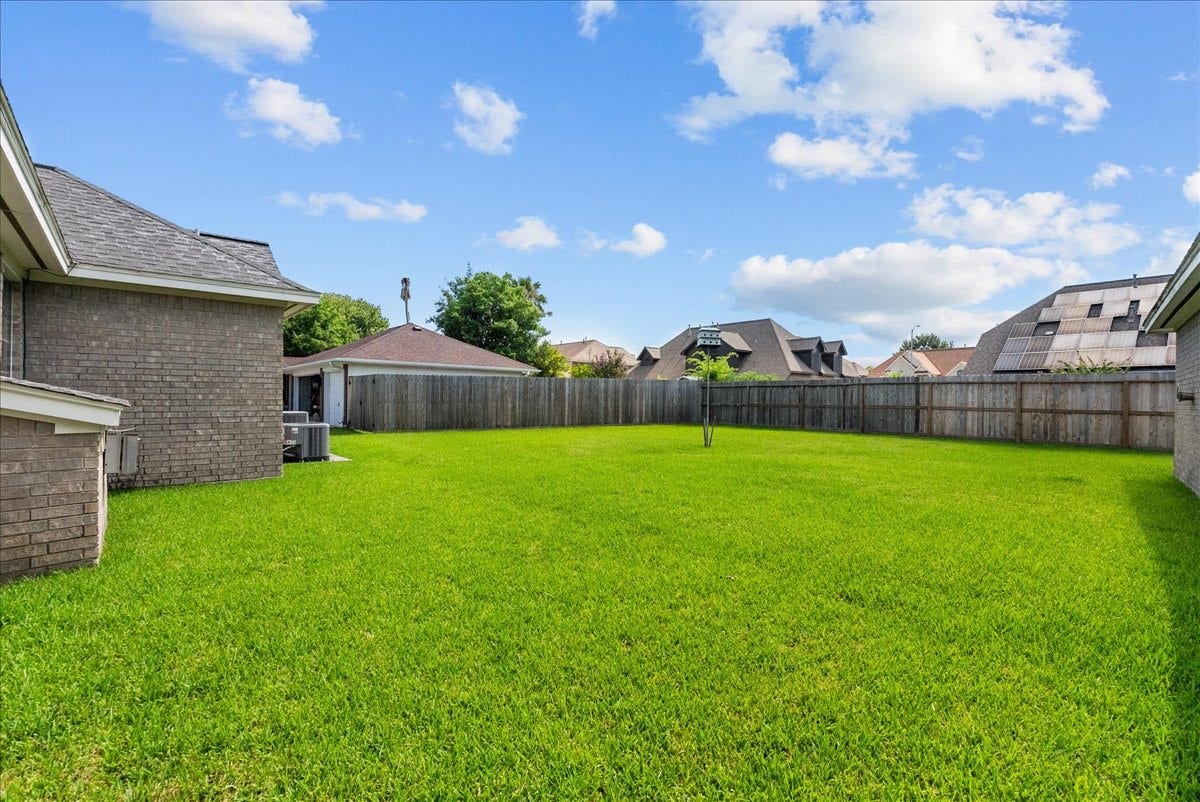 4402 Santee Drive, Baytown, TX 77521 Unobstructed daylight pours across the expansive grounds.