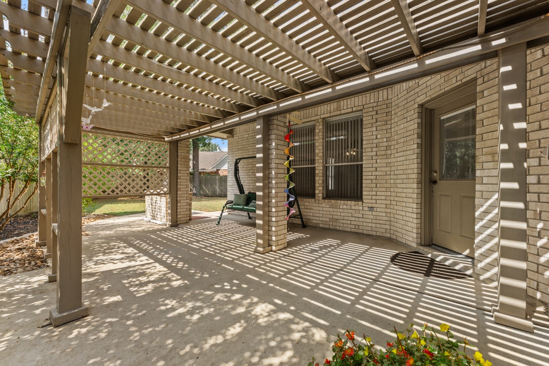 16503 Oat Mill Drive, Houston, TX 77095 An expansive back patio can accommodate a full-sized dining table and comfy outdoor furniture!