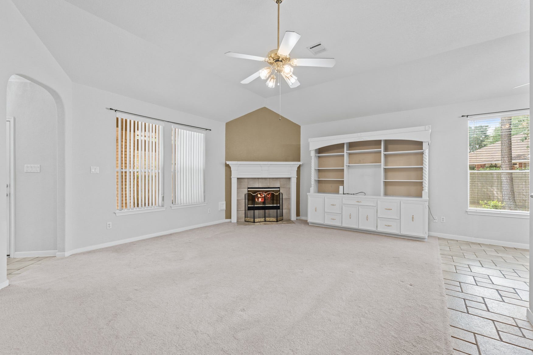 16503 Oat Mill Drive, Houston, TX 77095 Your living room offers a view to the back patio and includes a gas fireplace for chilly evenings, high ceilings, and is open to the other common areas of the house.