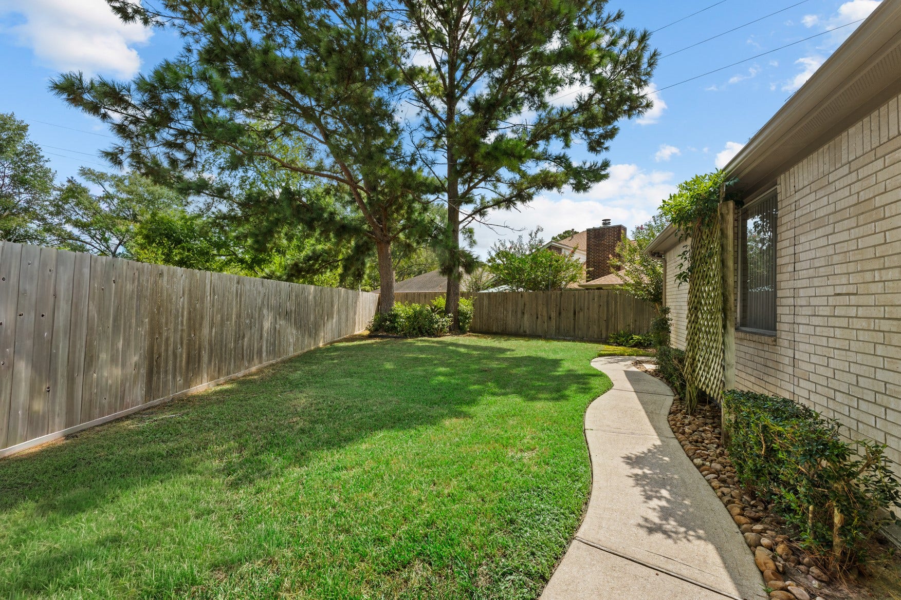 16503 Oat Mill Drive, Houston, TX 77095 This lot provides plenty of opportunity for gardening, lawn games, and even a pool!
