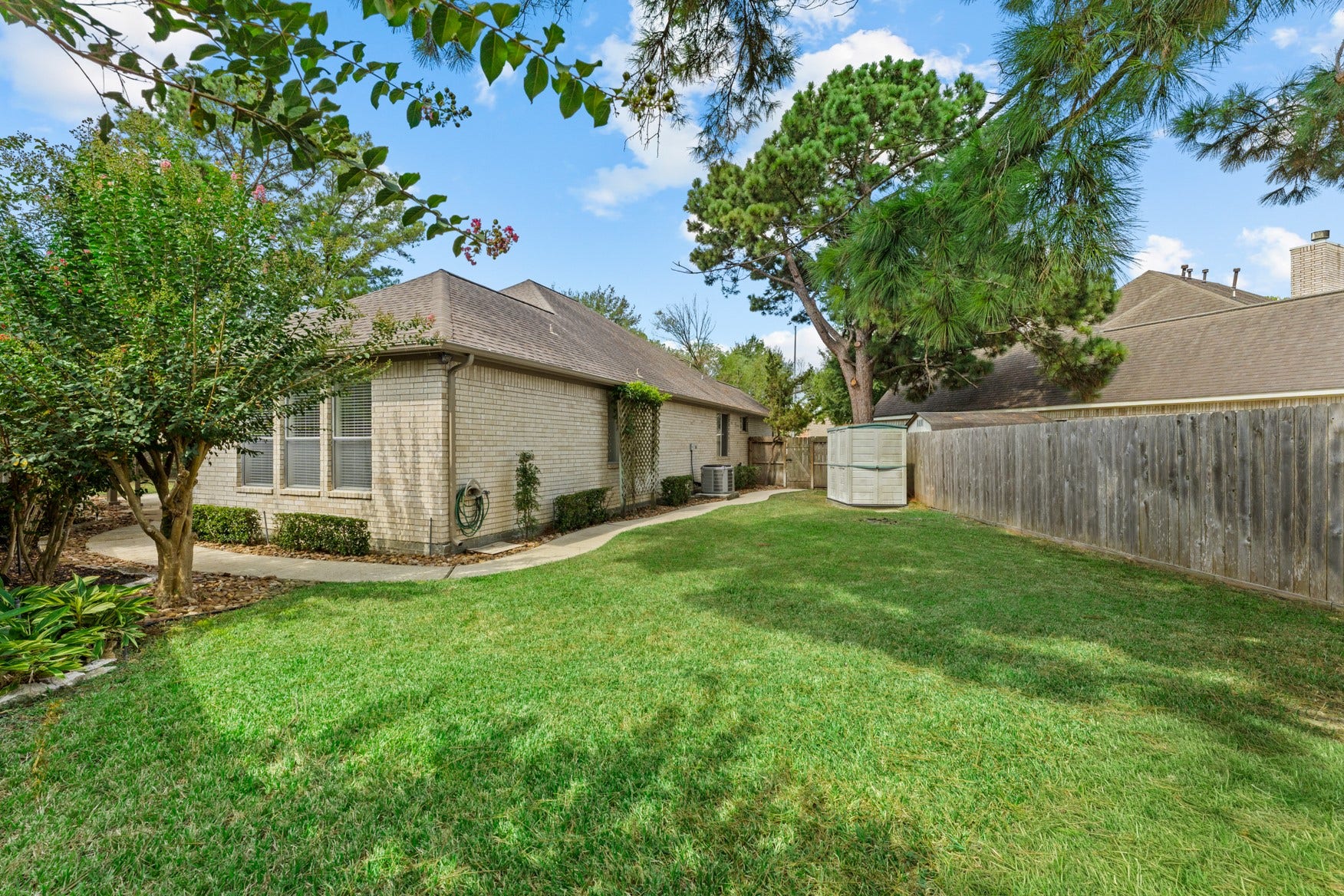 16503 Oat Mill Drive, Houston, TX 77095 Photo of the SECOND lawn area. Brick on all four sides of this home means low maintenance.