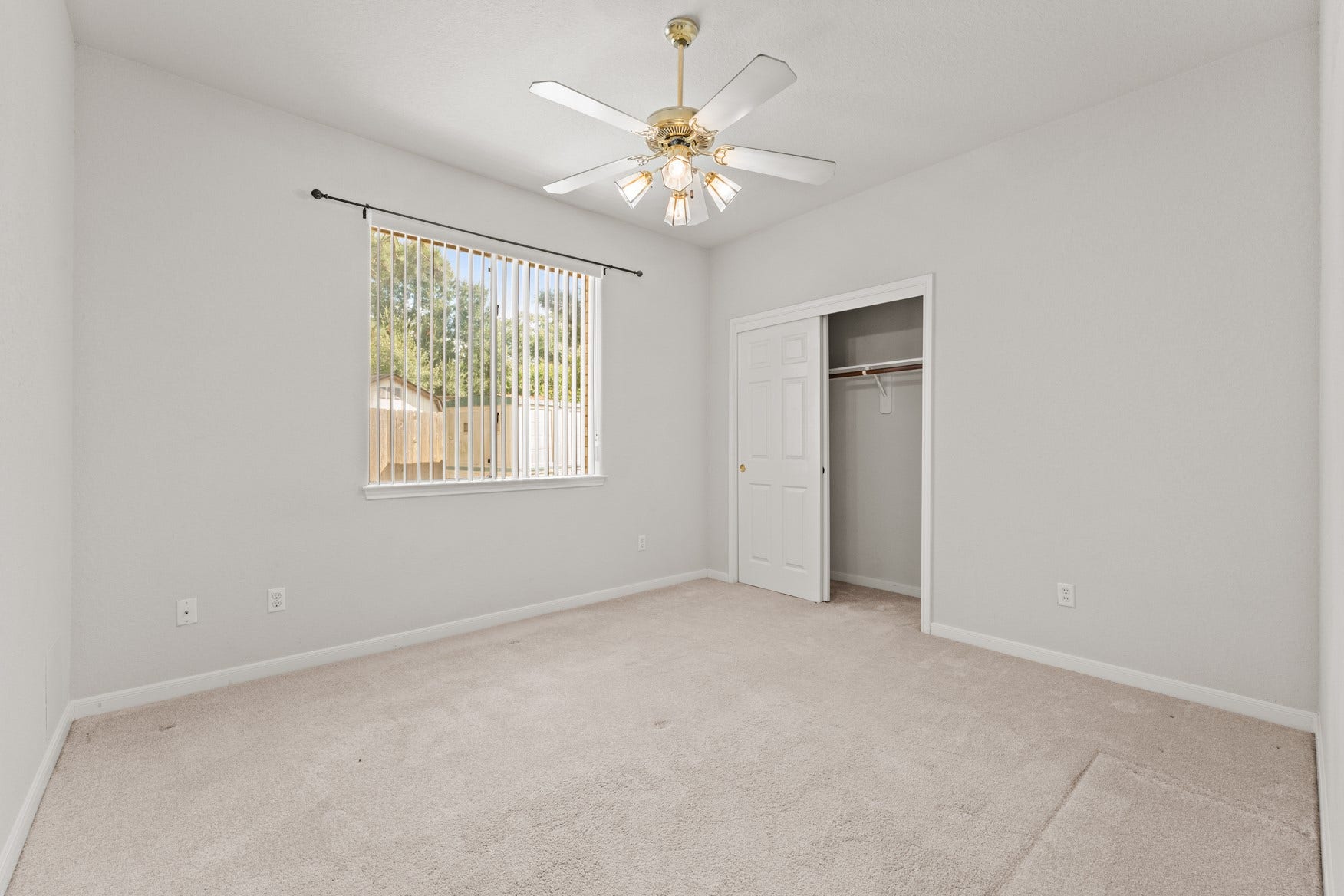 16503 Oat Mill Drive, Houston, TX 77095 The second guest bedroom overlooks the wide side yard and offers privacy from neighbors.