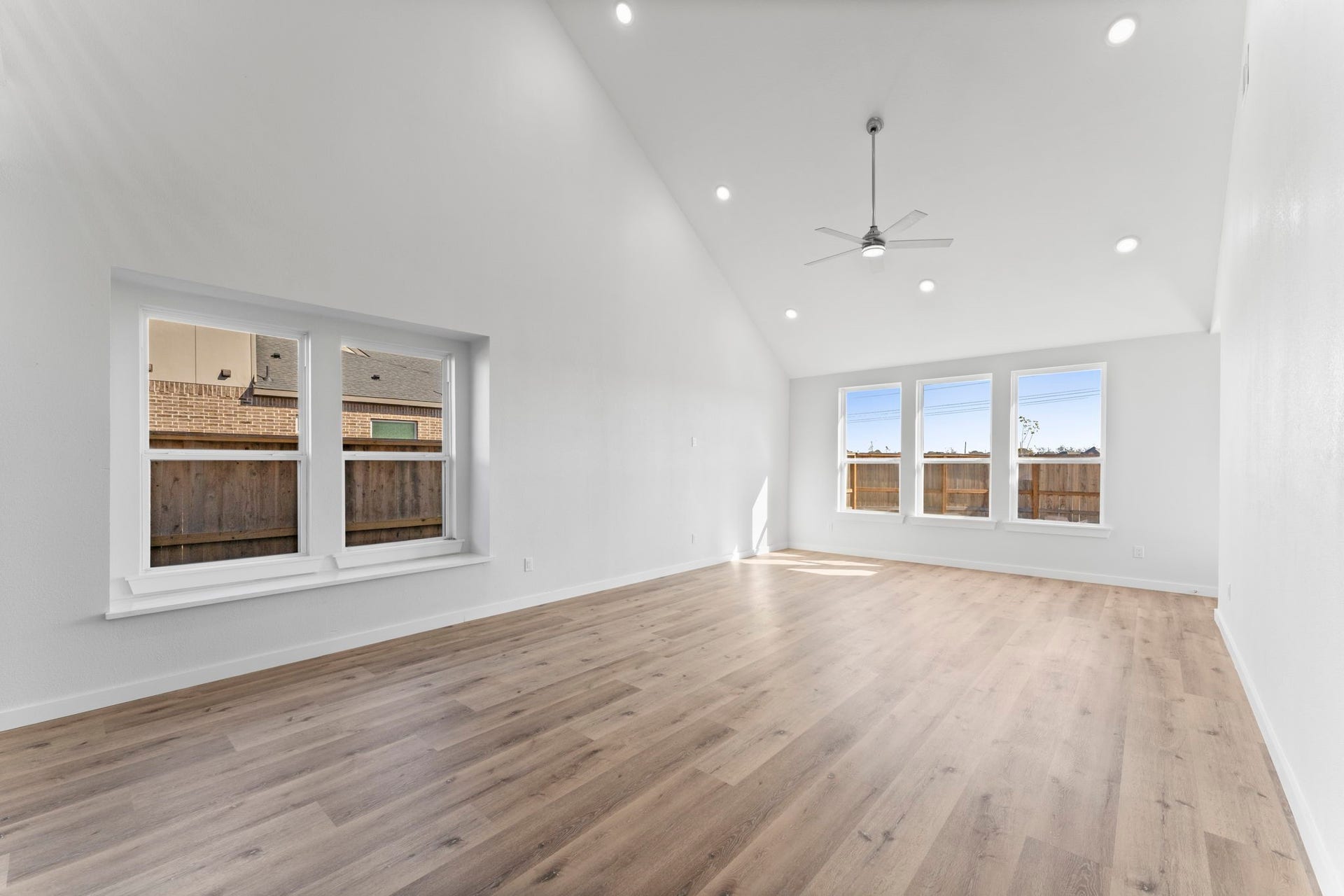 2230 Fresh Flower Way, Richmond, TX 77406 Perfect for large gatherings, this versatile space offers endless furniture arrangement possibilities under a striking high-pitched ceiling.