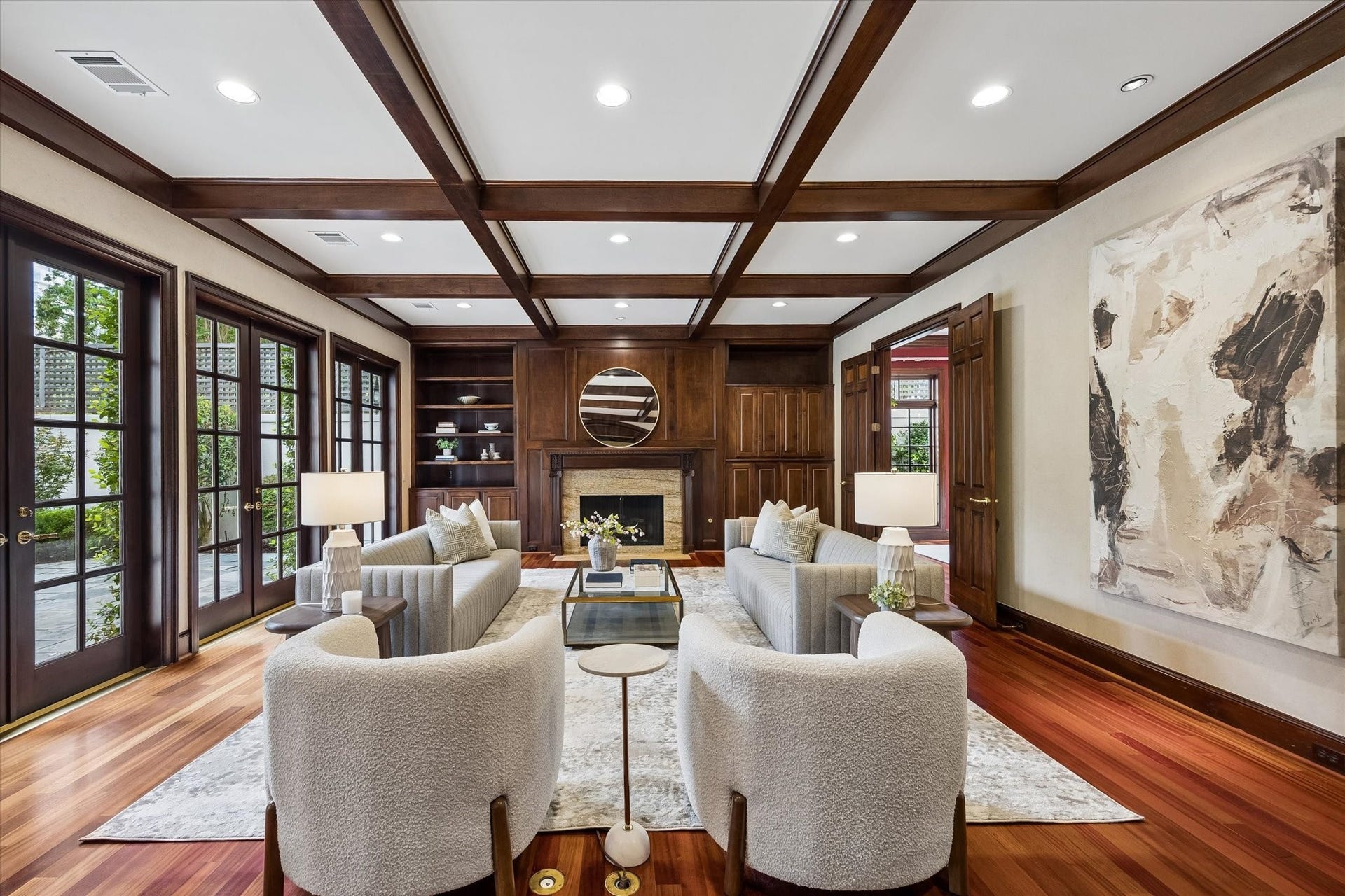 22 Eaton Square, Houston, TX 77027 Brazilian Cherry floors and 10 coffered beam ceiling with a spacious 19 x 33 layout distinguish the family rooms ability to host a variety of occasions from the casual day to day, family gatherings, or formal affairs