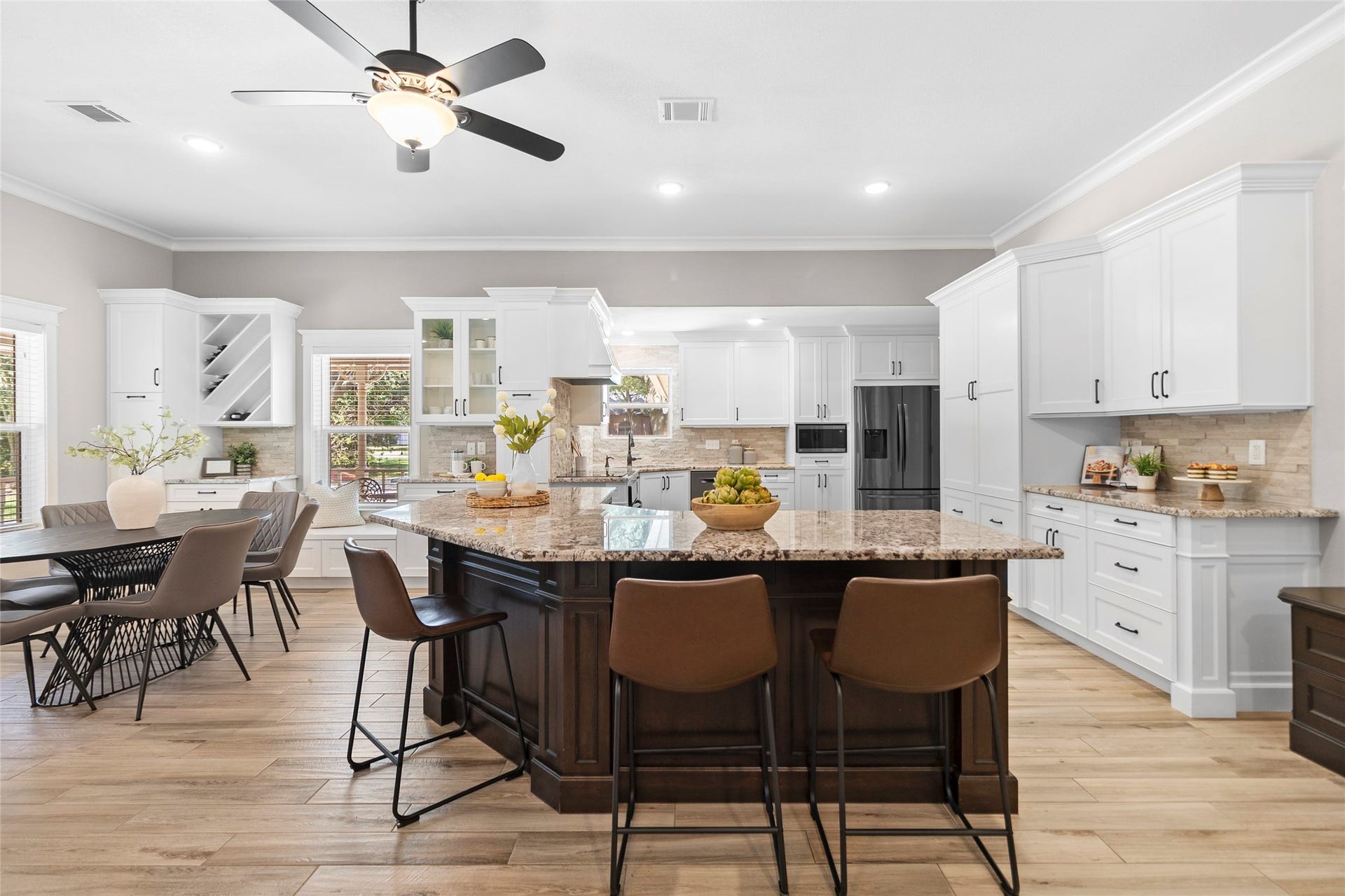 From the expansive island seating to the incredible storage and serving space, this kitchen was made for hosting holidays, celebrations, and everyday moments alike.
