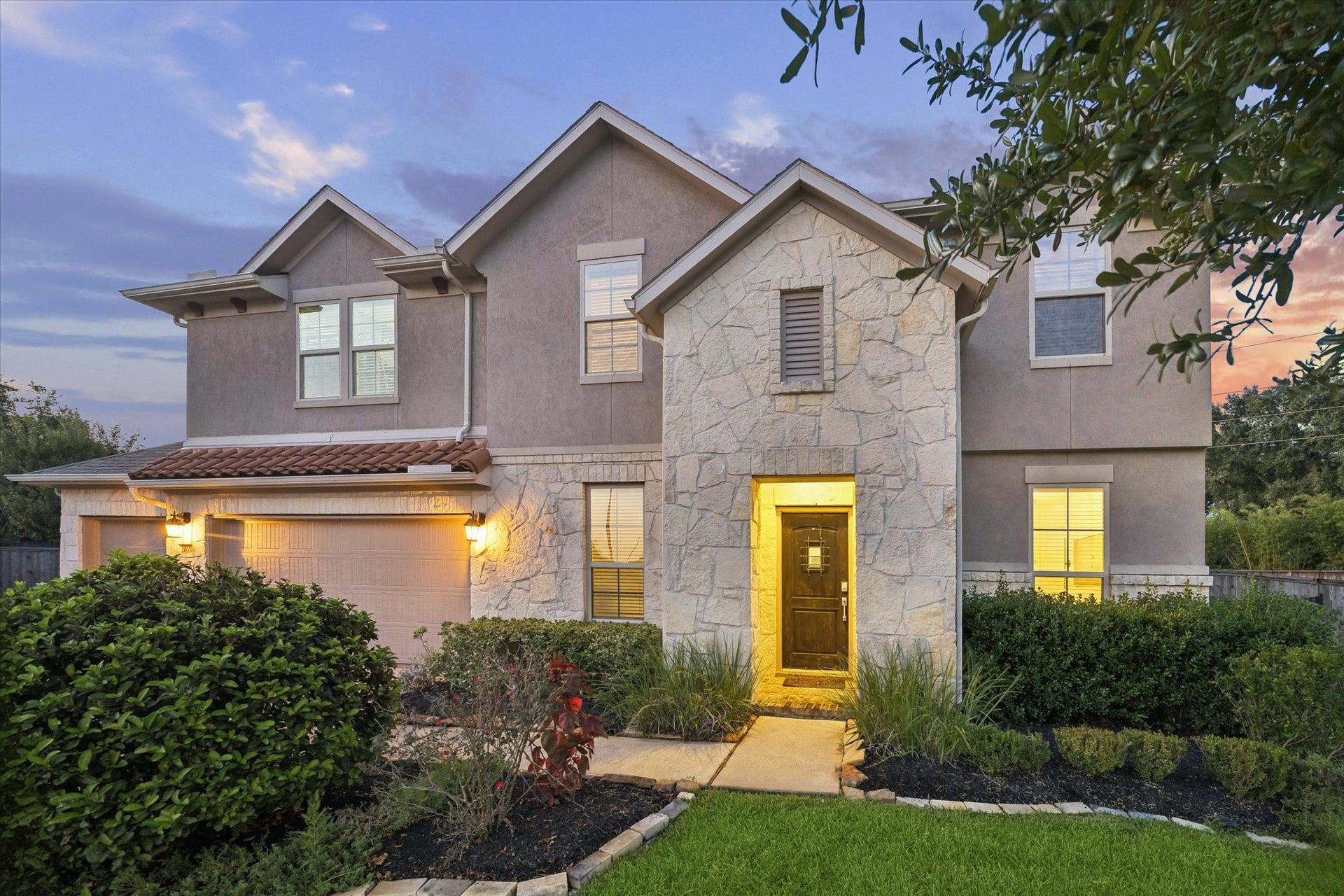 20338 Sienna Bluff Drive, Cypress, TX 77433 Accented speak-easy mahogany front door for privacy.