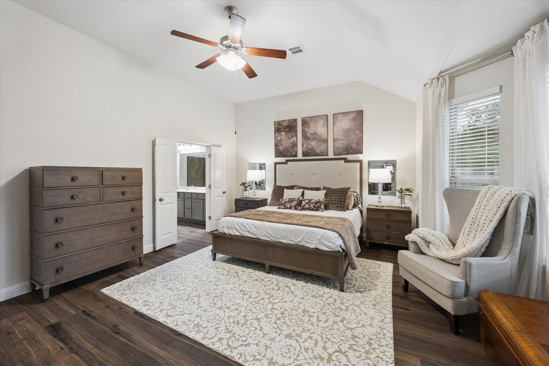 20338 Sienna Bluff Drive, Cypress, TX 77433 Great size primary bedroom that has spacious seating areas that creates a comfortable retreat for relaxing.