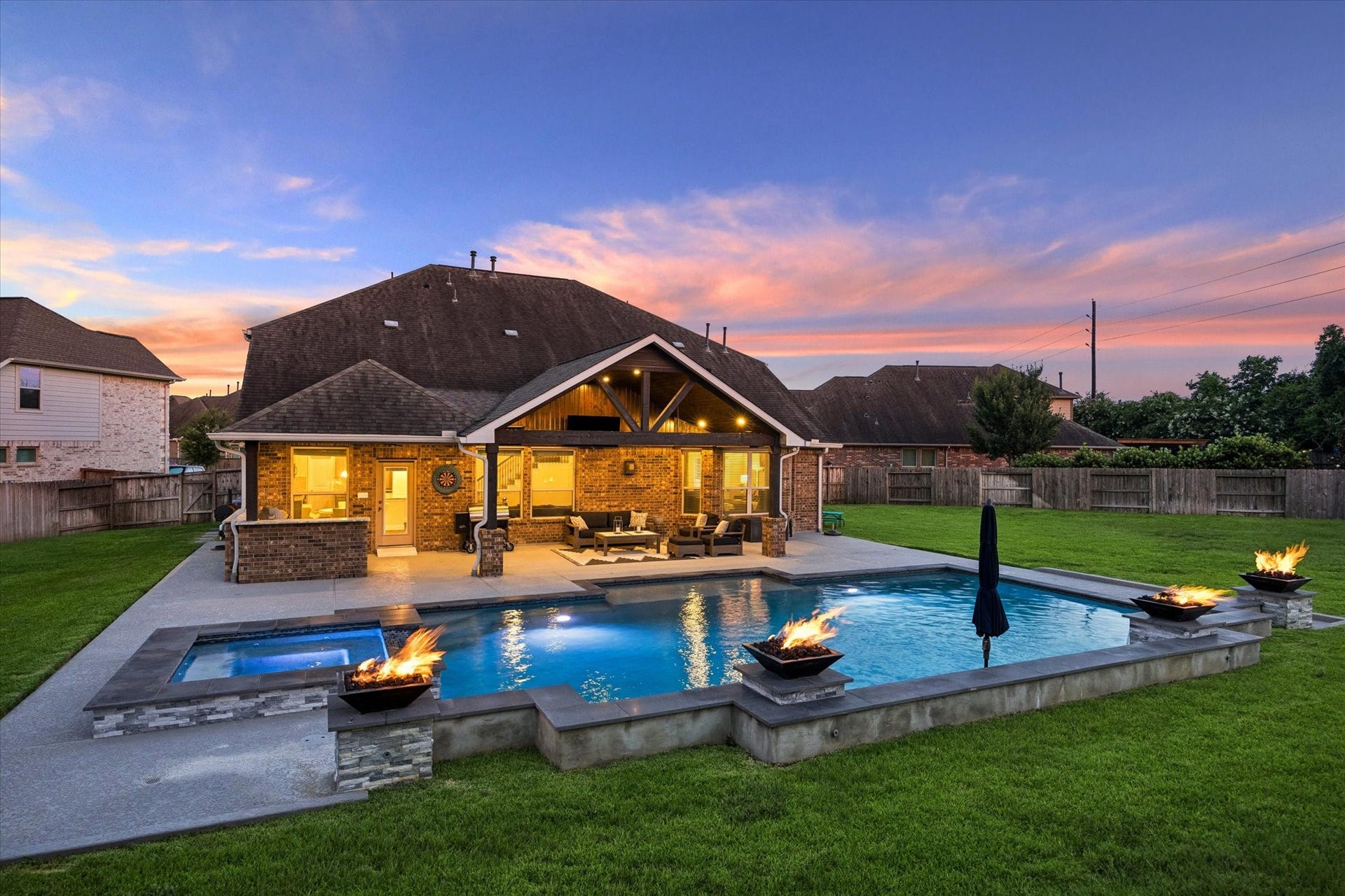 20338 Sienna Bluff Drive, Cypress, TX 77433 ALMOST A HALF OF AN ACRE manicured lawn provides plenty of room to play and unwind, while the privacy fencing creates a secluded atmosphere.
