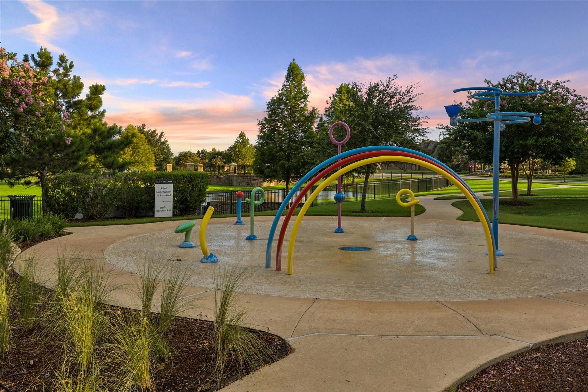 20338 Sienna Bluff Drive, Cypress, TX 77433 Enjoy the welcoming outdoor amenities of Falls at Dry Creek, featuring a beautifully landscaped community playground designed for fun, recreation, and connection.