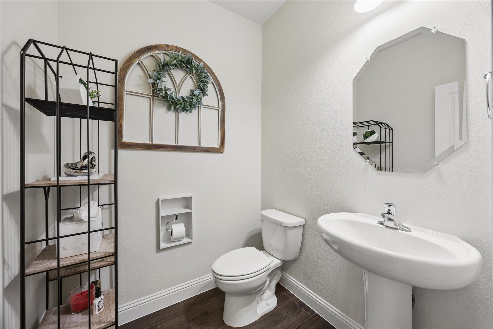 20338 Sienna Bluff Drive, Cypress, TX 77433 Charming powder room not too close to the kitchen with farmhouse accents.