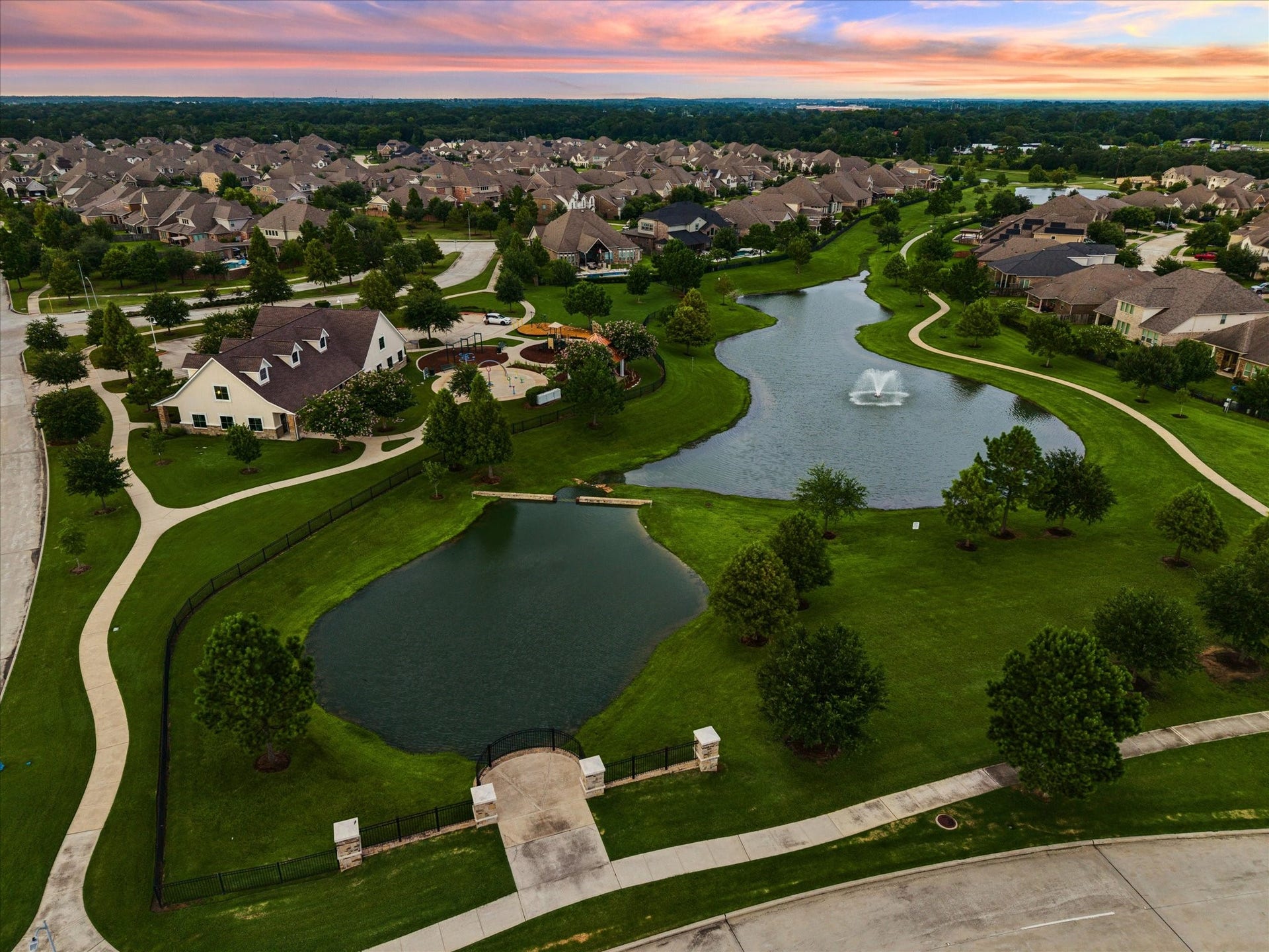 20338 Sienna Bluff Drive, Cypress, TX 77433 Experience the beauty and appeal of Falls at Dry Creek from above, where thoughtfully designed neighborhoods surround picturesque waterways and lush green spaces.