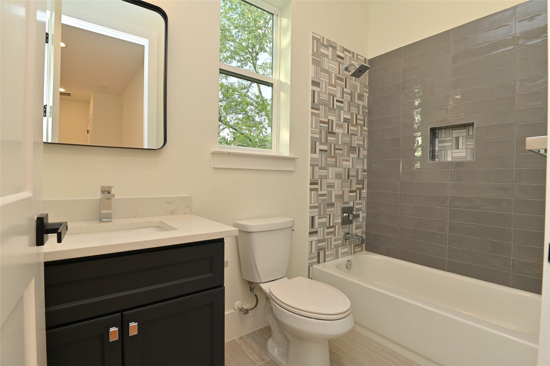 1733 Du Barry Lane, Houston, TX 77018 Guest baths with designer tile