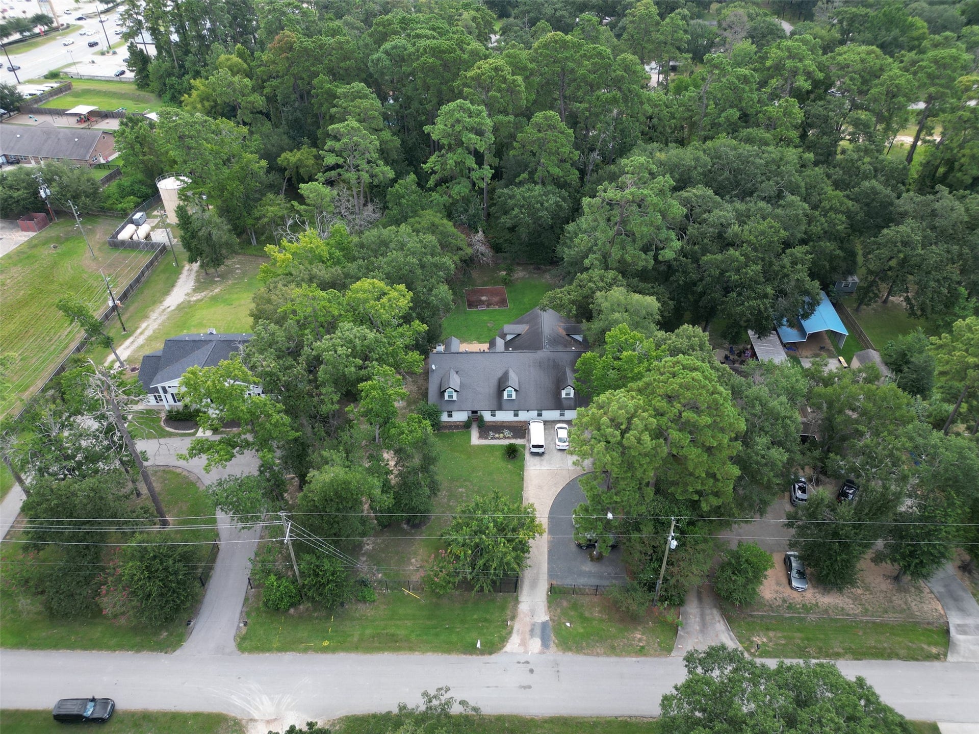 29902 E Hawthorne Drive, Spring, TX 77386 Both properties have passed Residential Board and Care Occupancy Inspections with 29818 operating as a group home for over 10 years. Both properties have full house generators, existing fire safety and sprinkler equipment, and extra parking. Front fence and two entry points with 29902 having a circular drive. Community uses a private water company with homes having private septic systems.